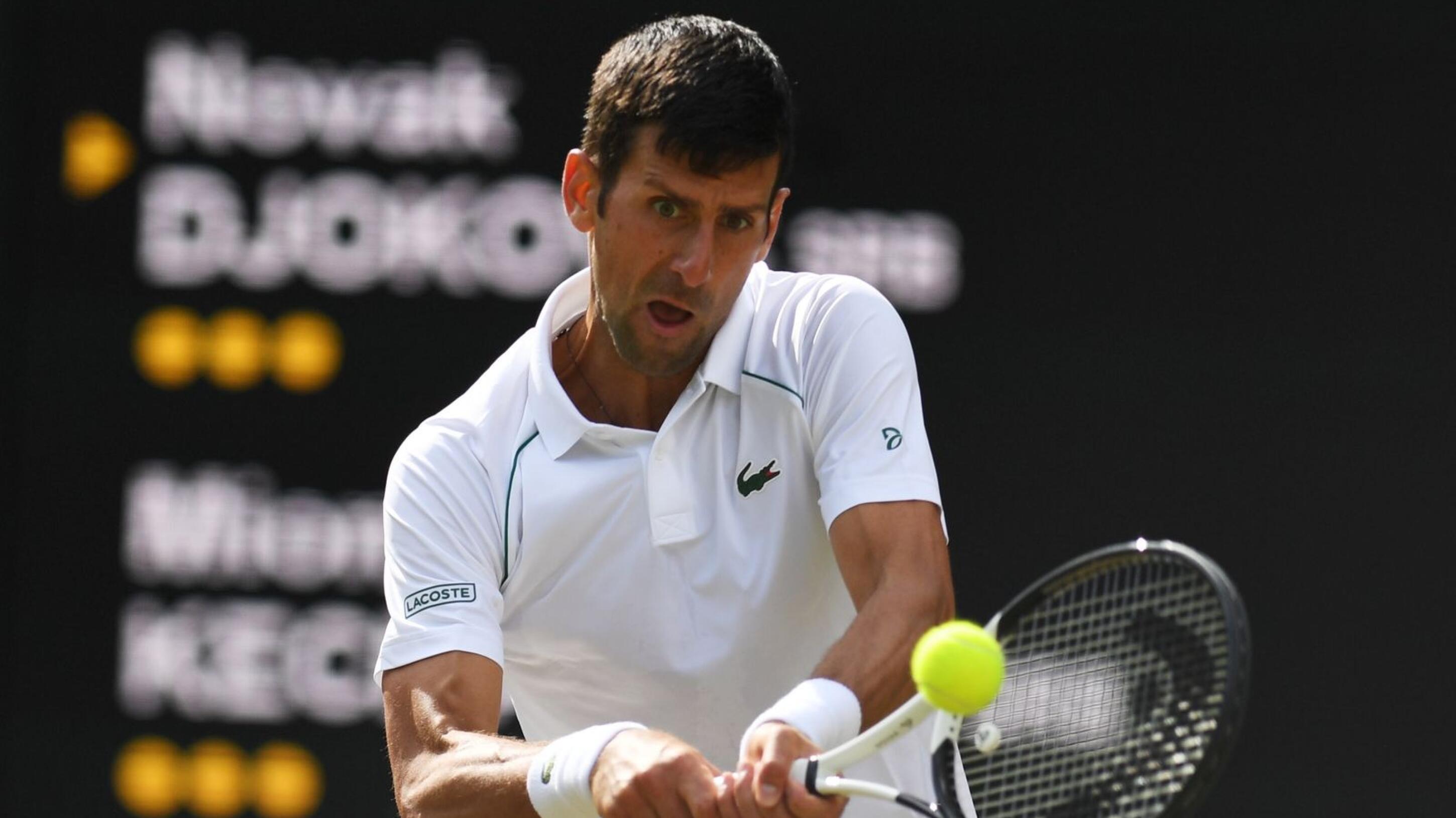 Novak Djokovic of Serbia in action in the men's third round match against Miomir Kecmanovic of Serbia at the Wimbledon Championships, in Wimbledon, Britain