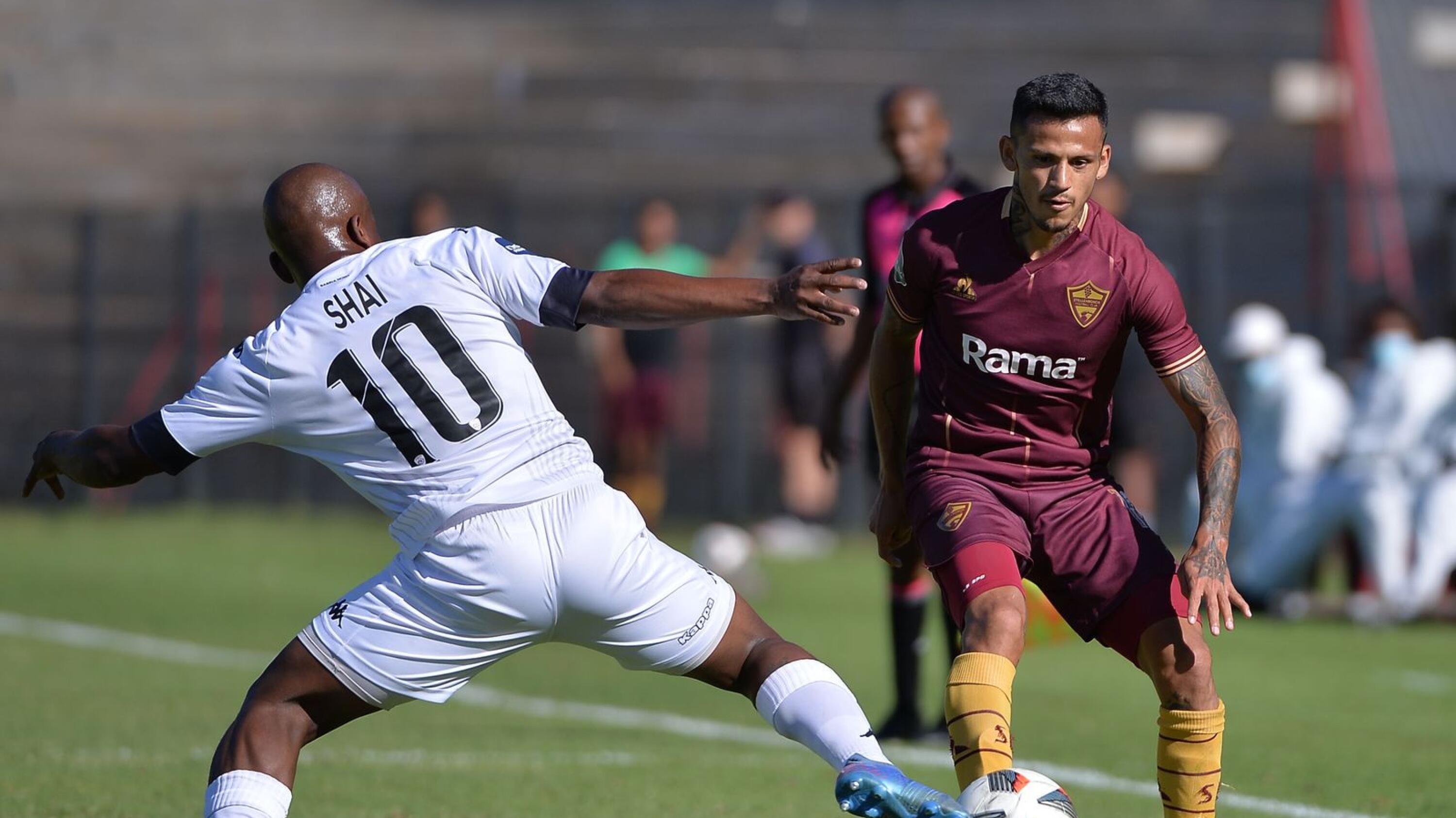 Junior Leandro Mendieta of Stellenbosch FC is challenged by Siyabulela Shai during their DStv Premiership match at Danie Craven Stadium in Stellenbosch on Saturday
