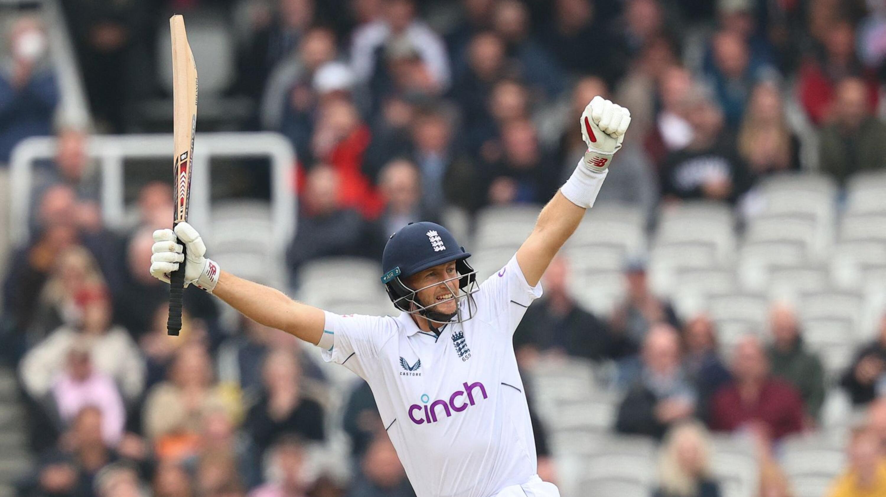 England's Joe Root celebrates scoring the winning runs on the fourth day of the first cricket Test match against New Zealand at Lord's cricket ground in London on Sunday