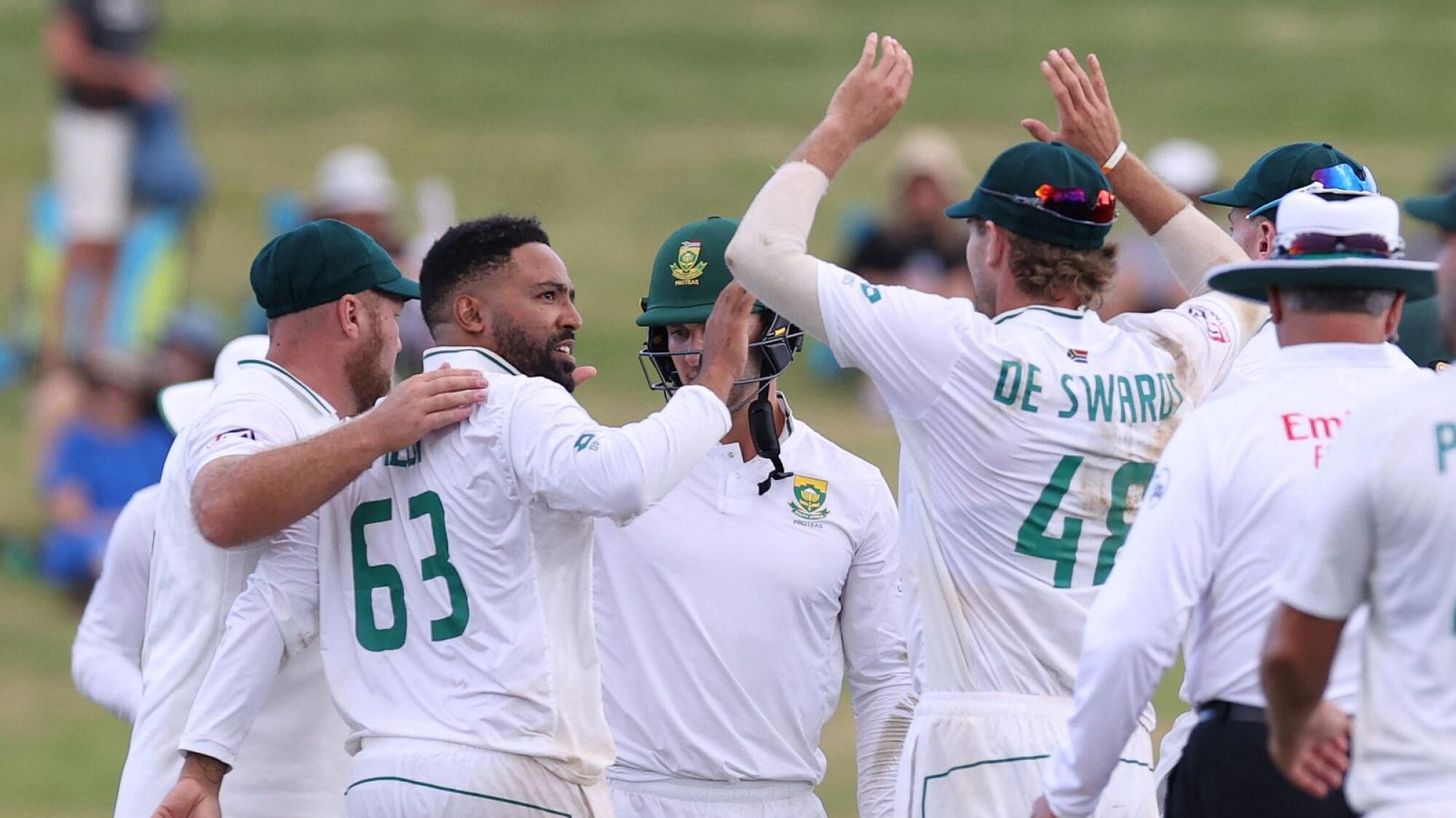 Proteas off-spinner Dane Piedt celebrates his fifth wicket against New Zealand with his teammates.