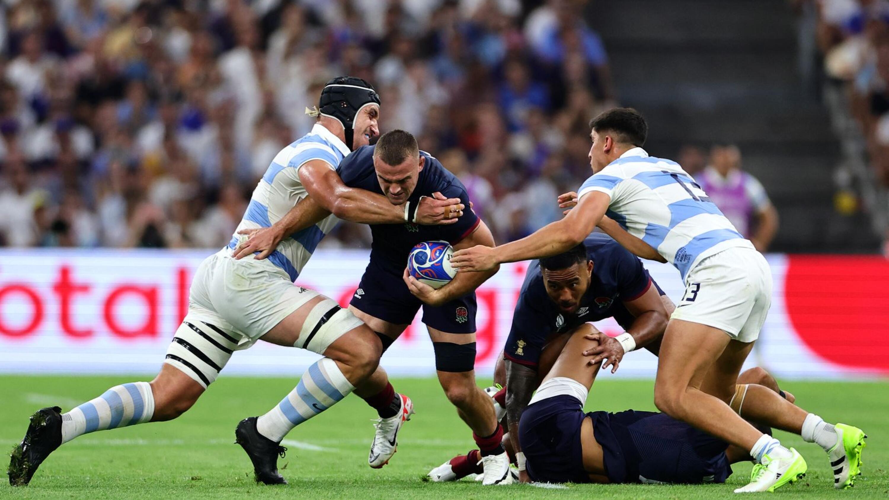 England's number eight Ben Earl runs with the ball during their Rugby World Cup Pool D match against Argentina at Stade de Marseille in Marseille on Saturday