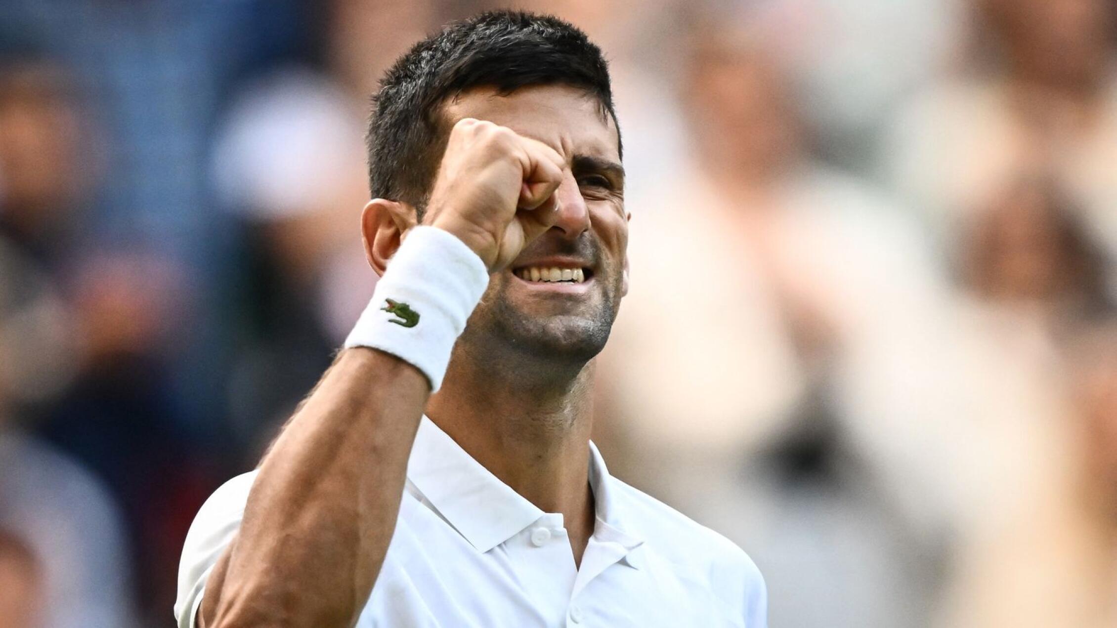 Serbia's Novak Djokovic celebrates after winning against Australia's Jordan Thompson during their men's singles tennis match on the third day of the 2023 Wimbledon Championships on Wednesday