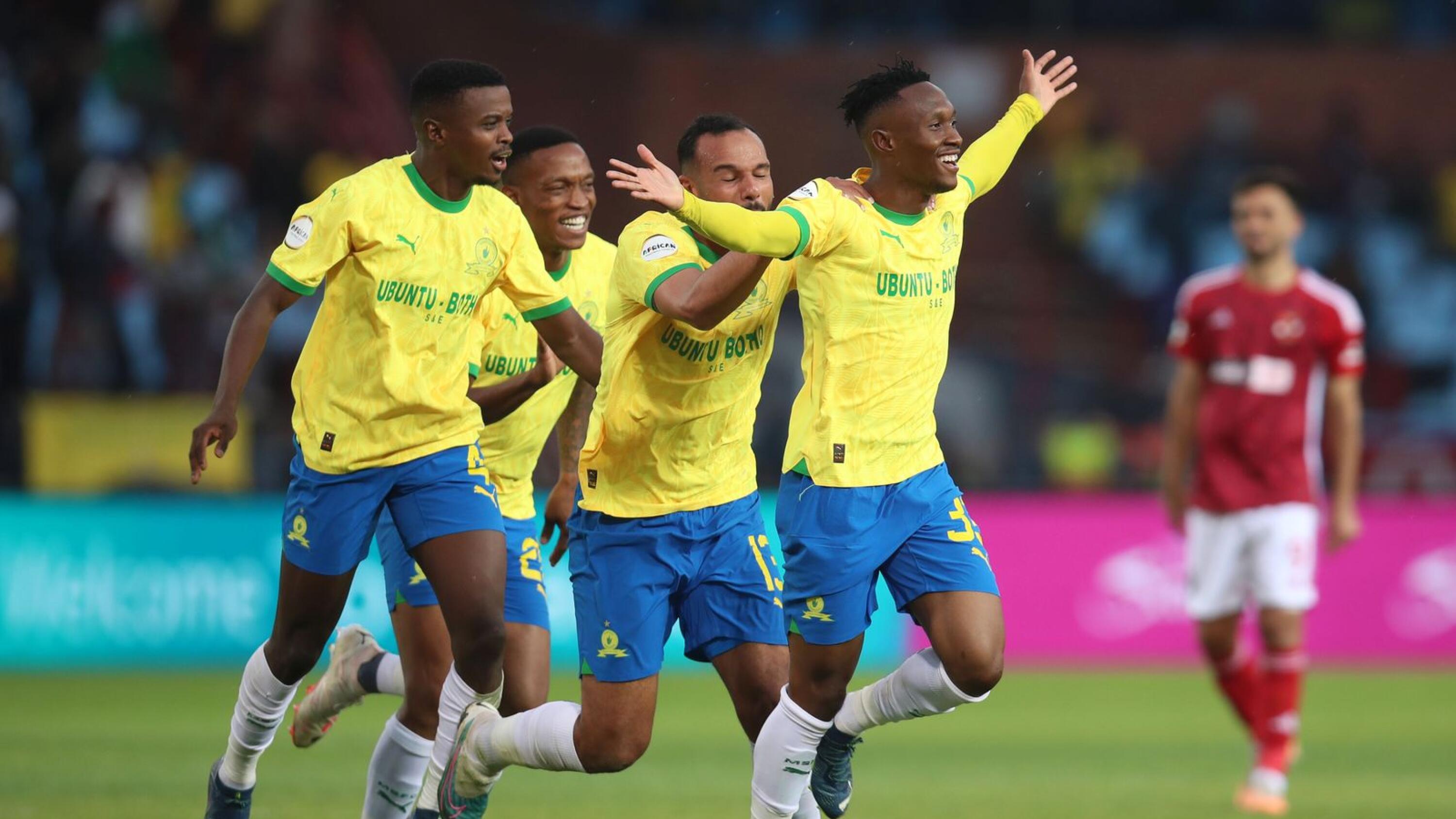 Mamelodi Sundowns’ Thapelo Maseko celebrates with teammates after scoring a goal during their African Football League match against Al Ahly