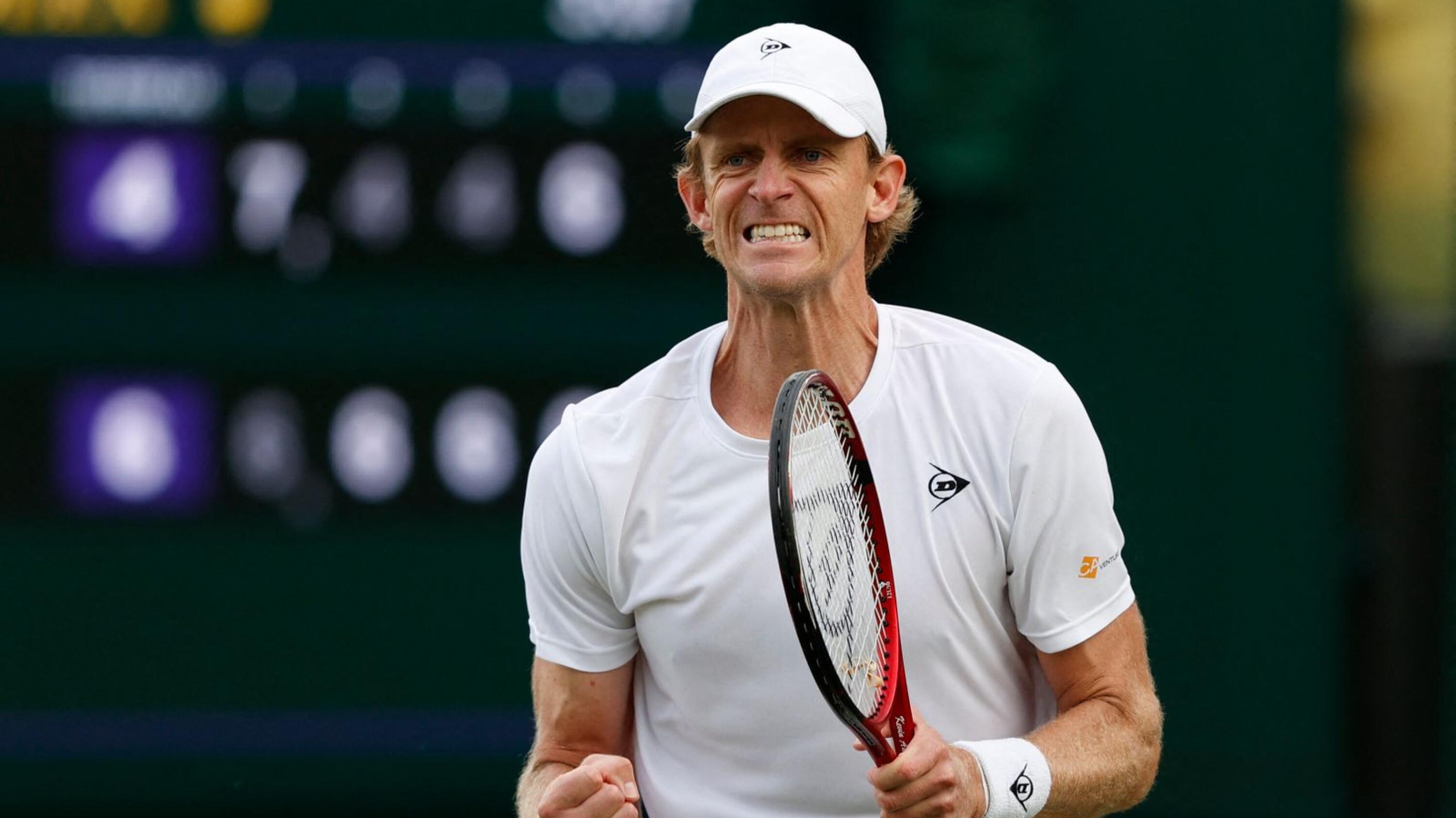 South Africa's Kevin Anderson reacts while playing Chile's Marcelo Tomas Barrios Vera on the first day of the 2021 Wimbledon Championships at the The All England Tennis Club in Wimbledon, southwest London, on June 28, 2021