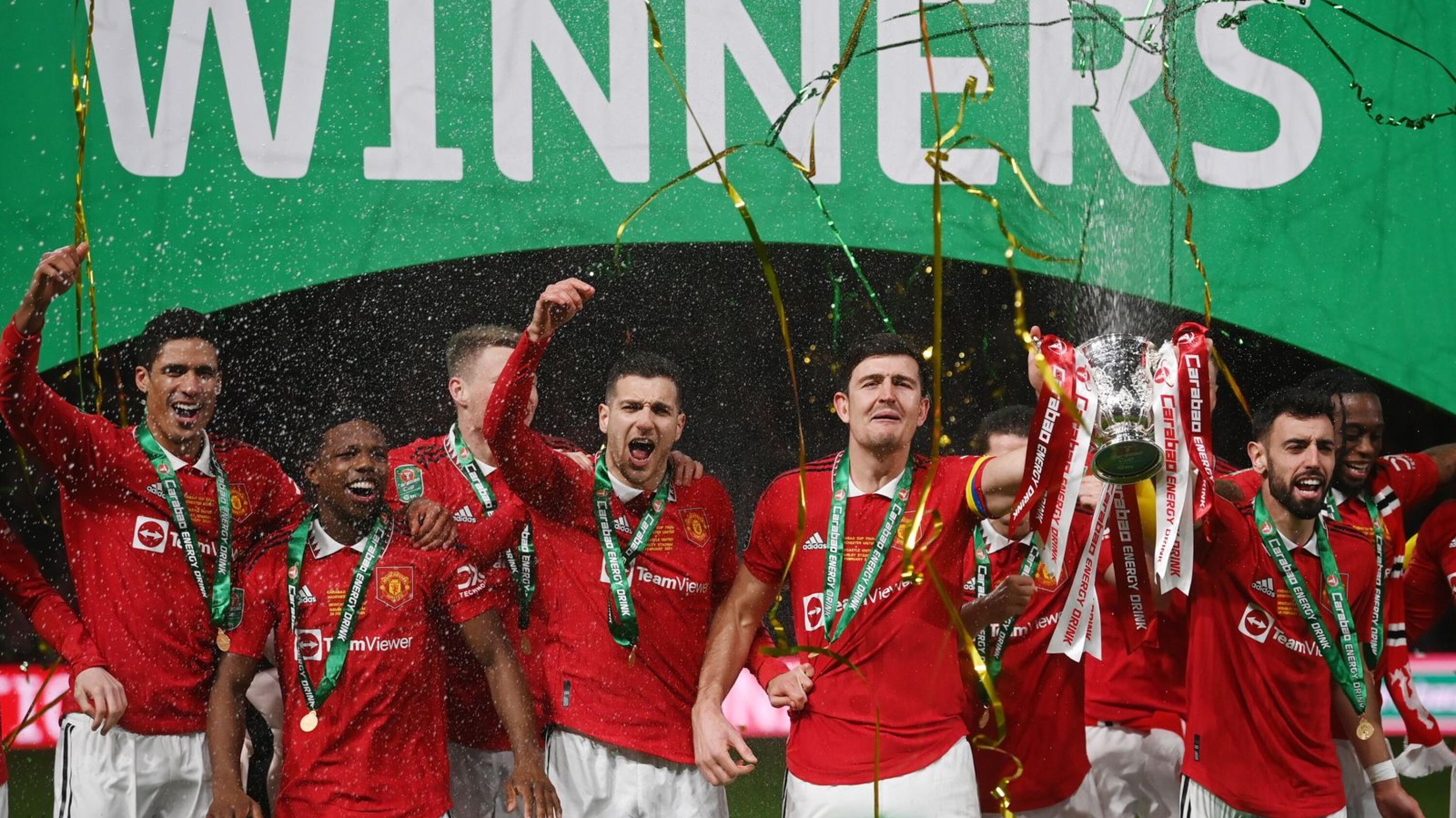Manchester United celebrate after winning the Carabao Cup final against Newcastle United on Sunday