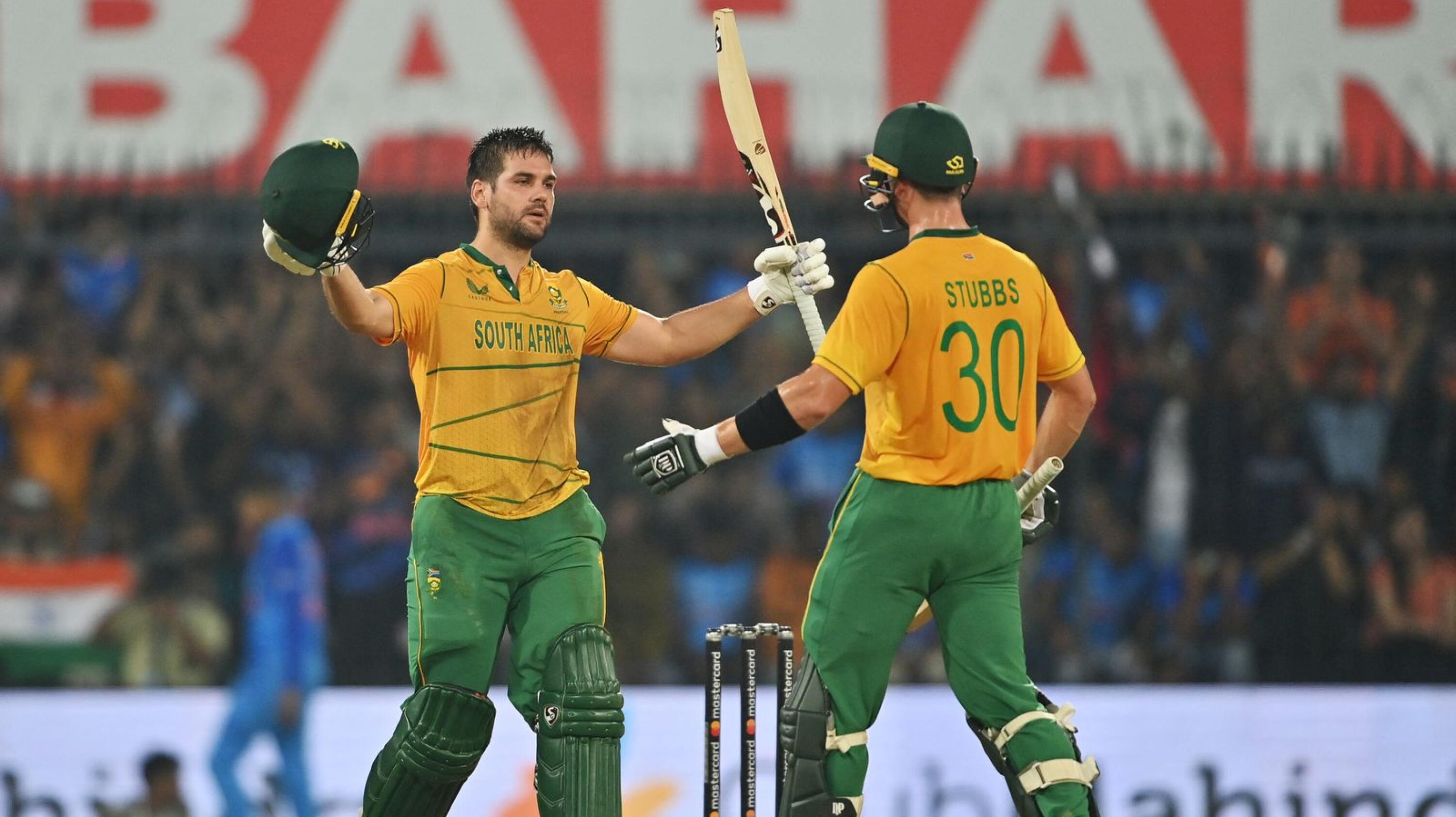 Rilee Rossouw celebrates with Tristan Stubbs after scoring a century during the third and final T20 international against India at the Holkar Cricket Stadium on Tuesday.