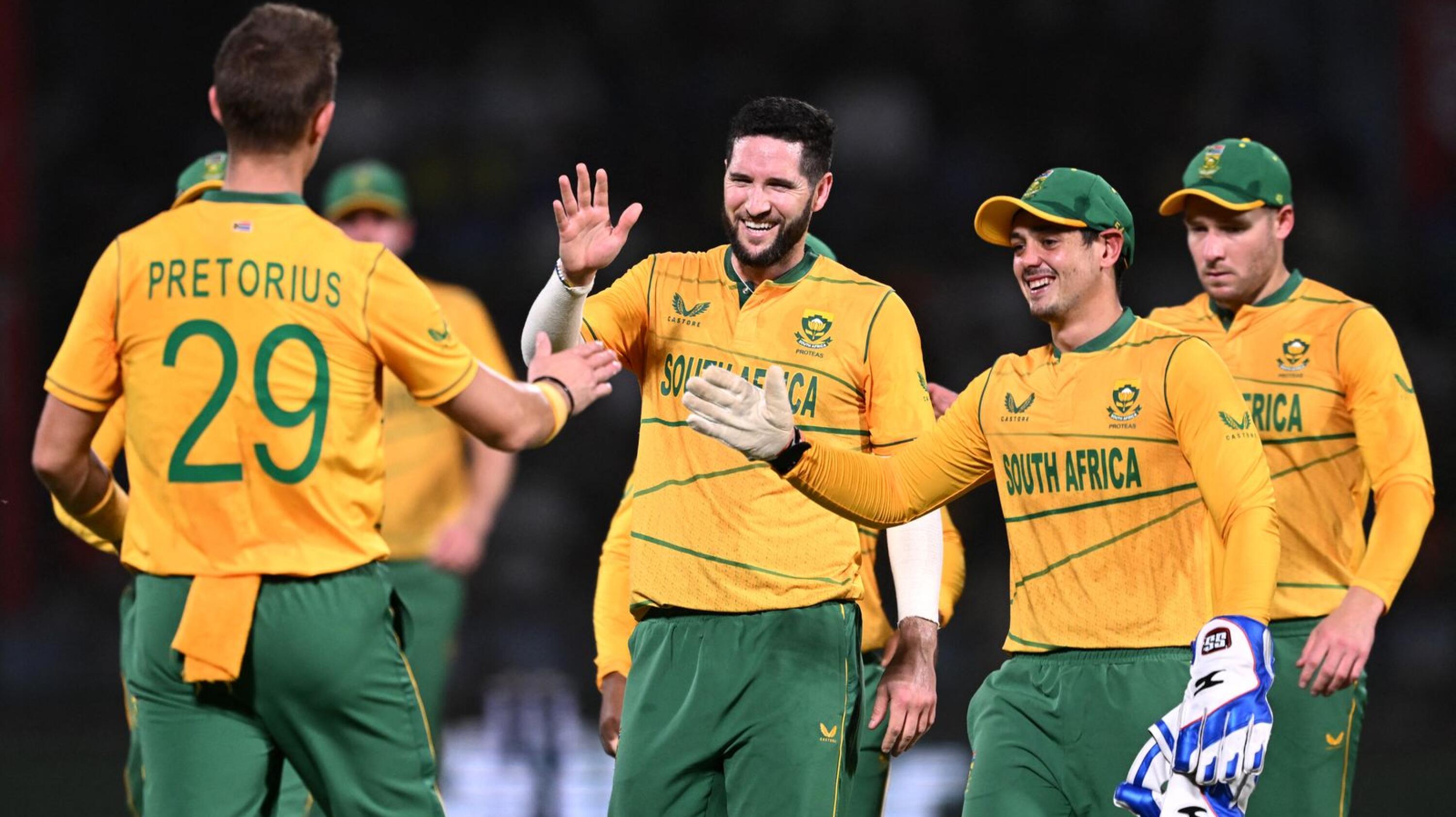 South Africa's Wayne Parnell (C) celebrates with teammates after taking the wicket of India's Ruturaj Gaikwad (not pictured) during the first Twenty20 international cricket match at the Arun Jaitley Stadium in New Delhi on Thursday