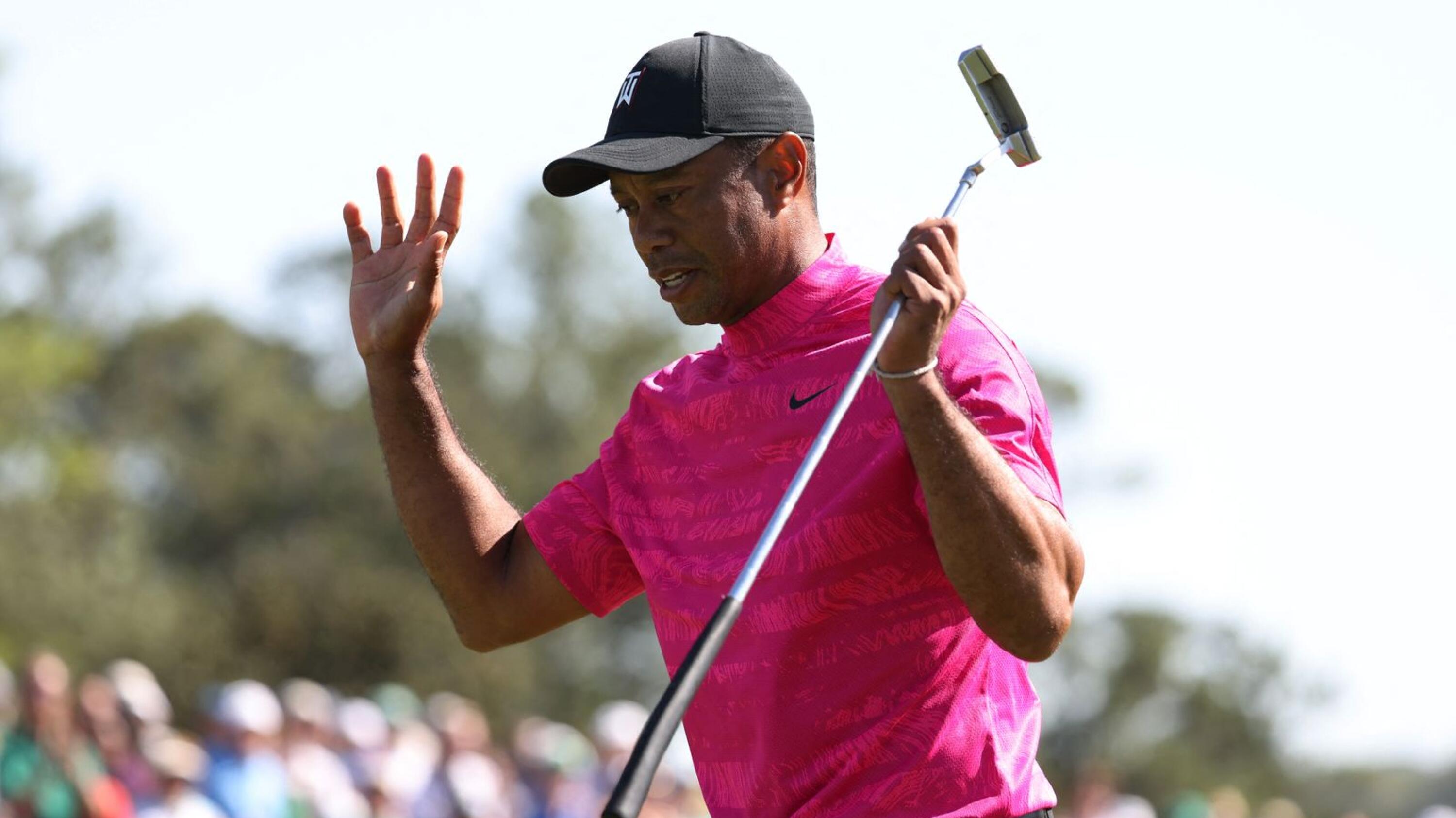 Tiger Woods of the US acknowledges patrons on the 18th green after finishing the first round of the Masters at Augusta National Golf Club in Augusta, Georgia on Thursday