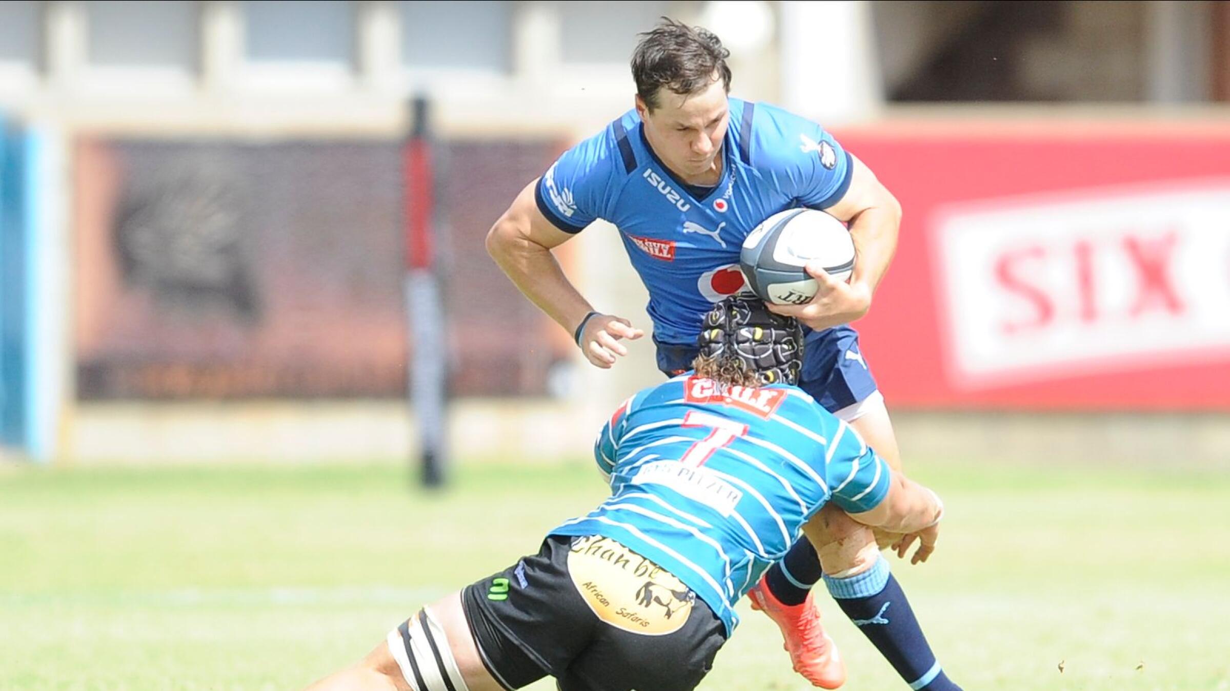 Bulls flyhalf Chris Smith carries the ball during their Carling Currie Cup match against Griquas at Tafel Lager Park in Kimberley on Saturday