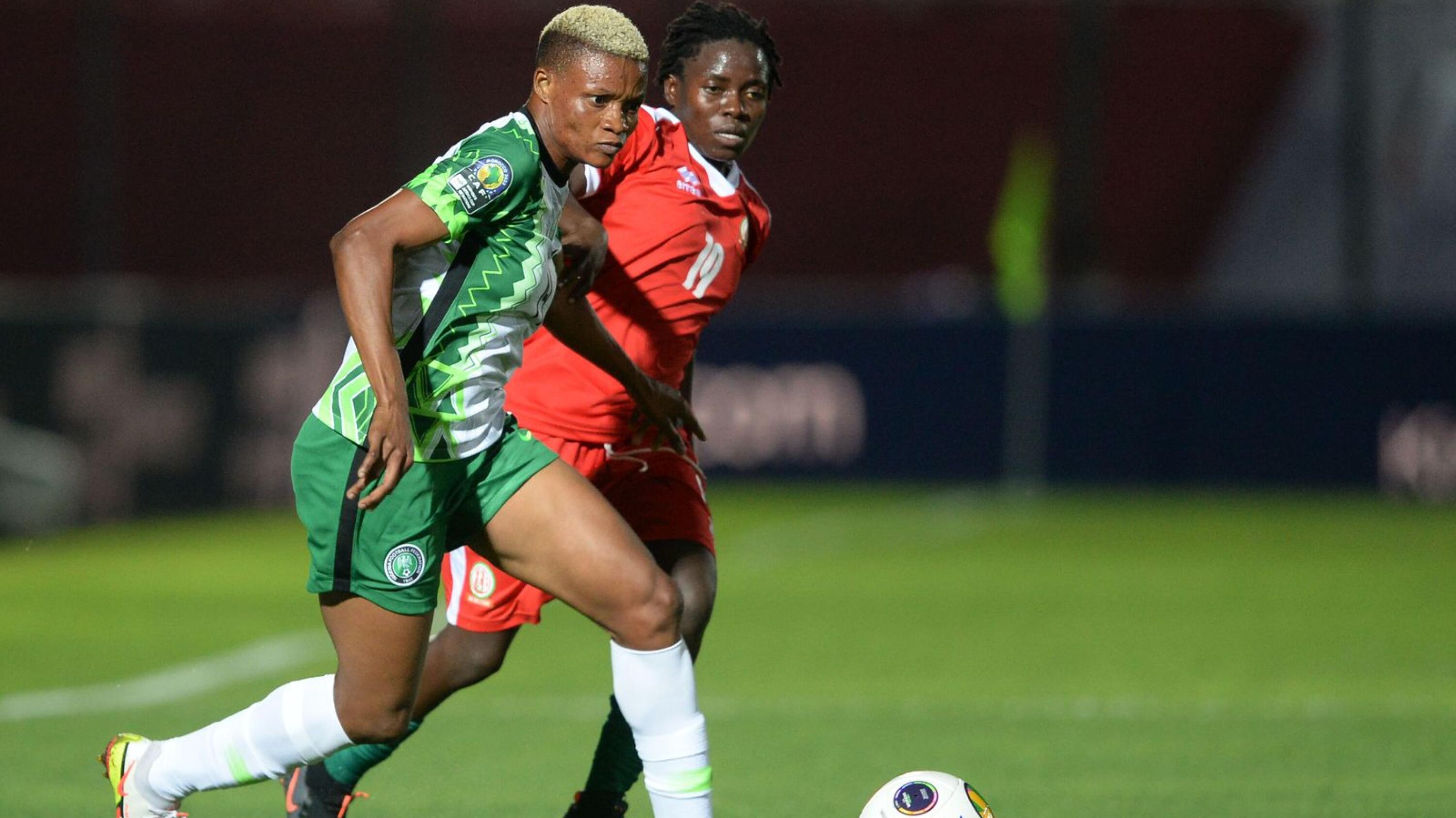 Vivian Obianujuwan Ikechukwu of Nigeria is challenged by Rachelle Bukuru of Burundi during the 2022 Women’s Africa Cup of Nations game at Stade Prince Moulay Al Hassan in Rabat