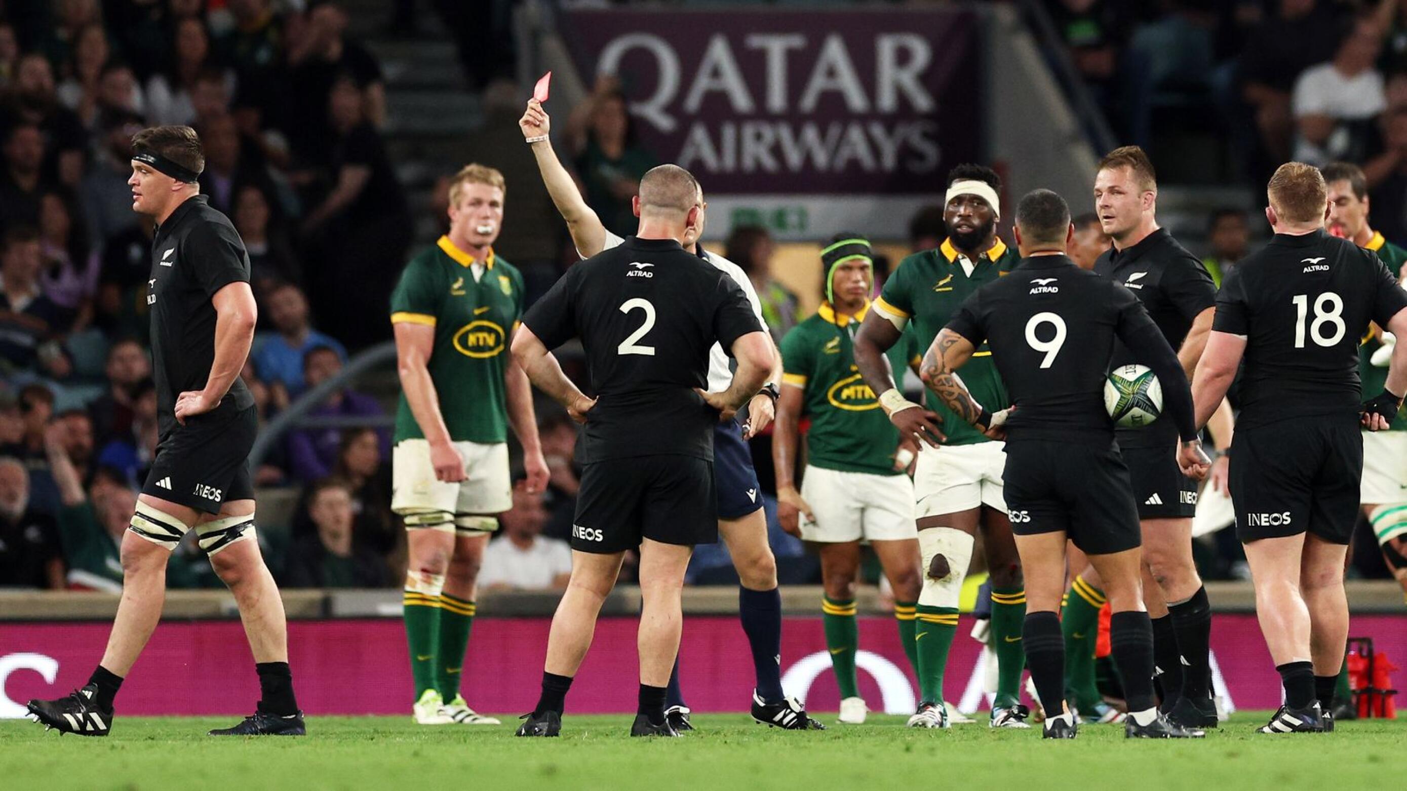New Zealand's lock Scott Barrett (L) leaves leaves the pitch after being sent off during the pre-World Cup Rugby Union match between New Zealand and South Africa at Twickenham Stadium in west London