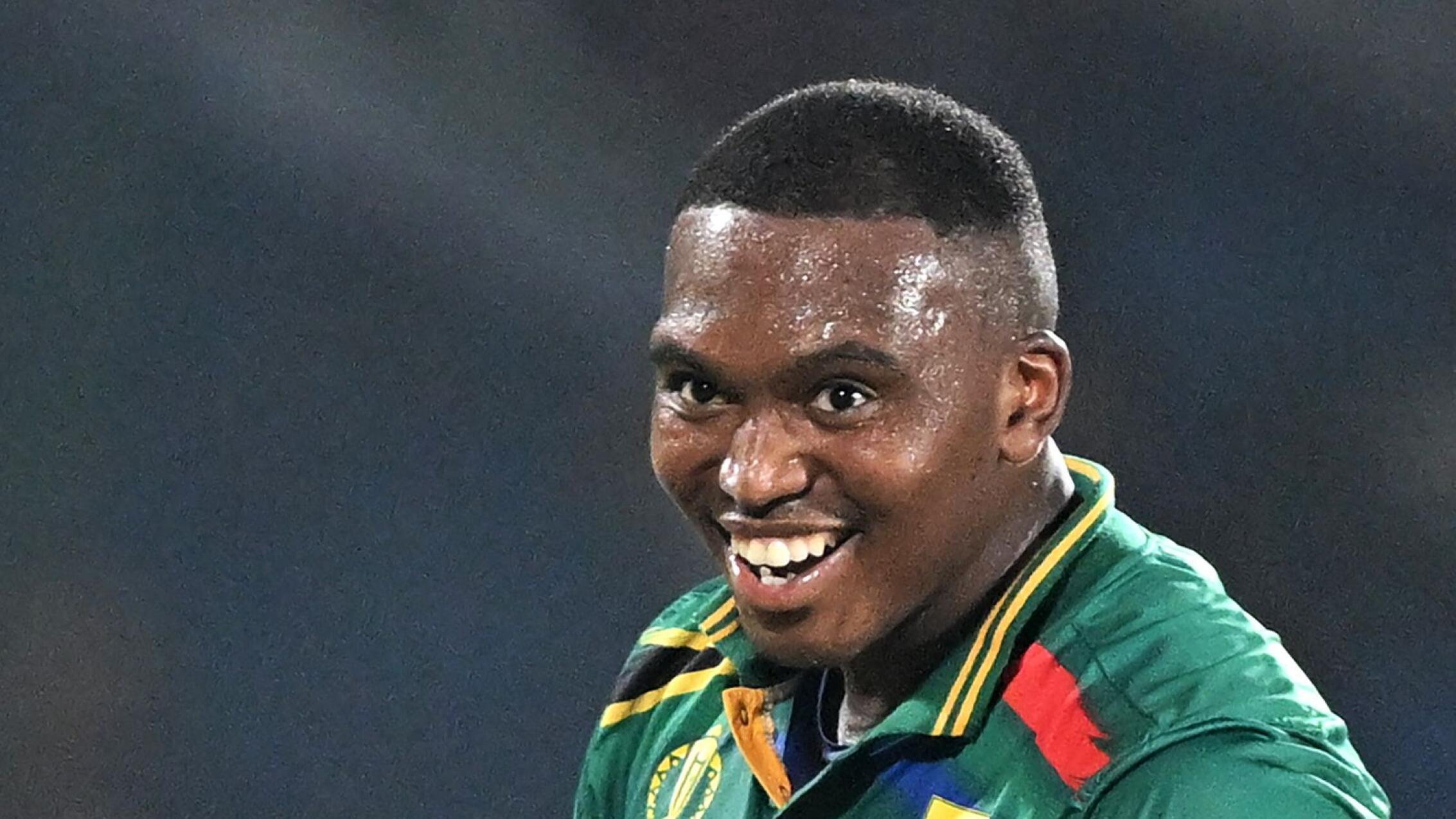 South Africa's Lungi Ngidi celebrates after taking the wicket of Sri Lanka's Charith Asalanka during the 2023 ICC Men's Cricket World Cup one-day international (ODI) match between South Africa and Sri Lanka at the Arun Jaitley Stadium in New Delhi