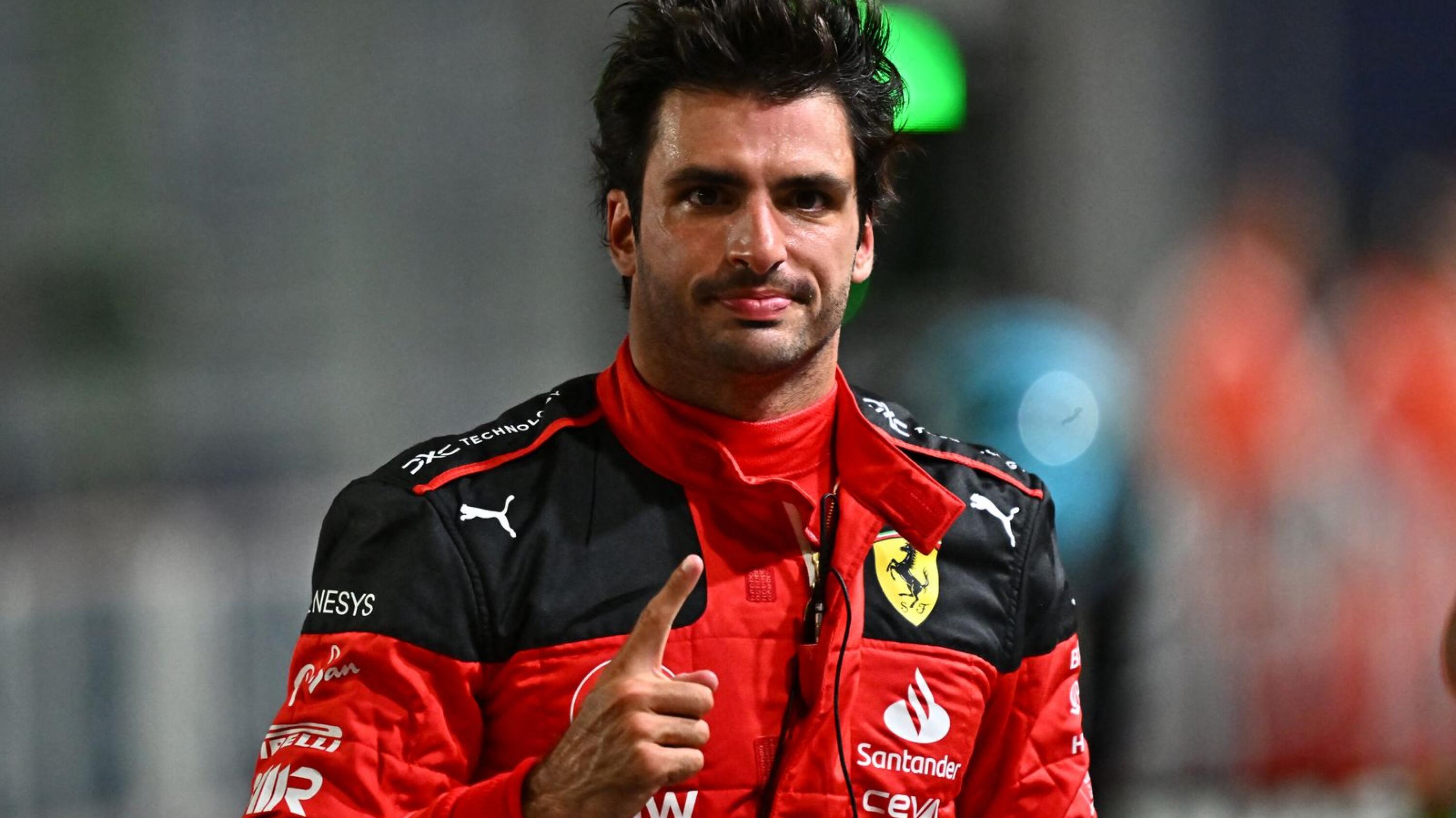 Ferrari's Spanish driver Carlos Sainz Jr gestures after the qualifying session of the Singapore Formula One Grand Prix