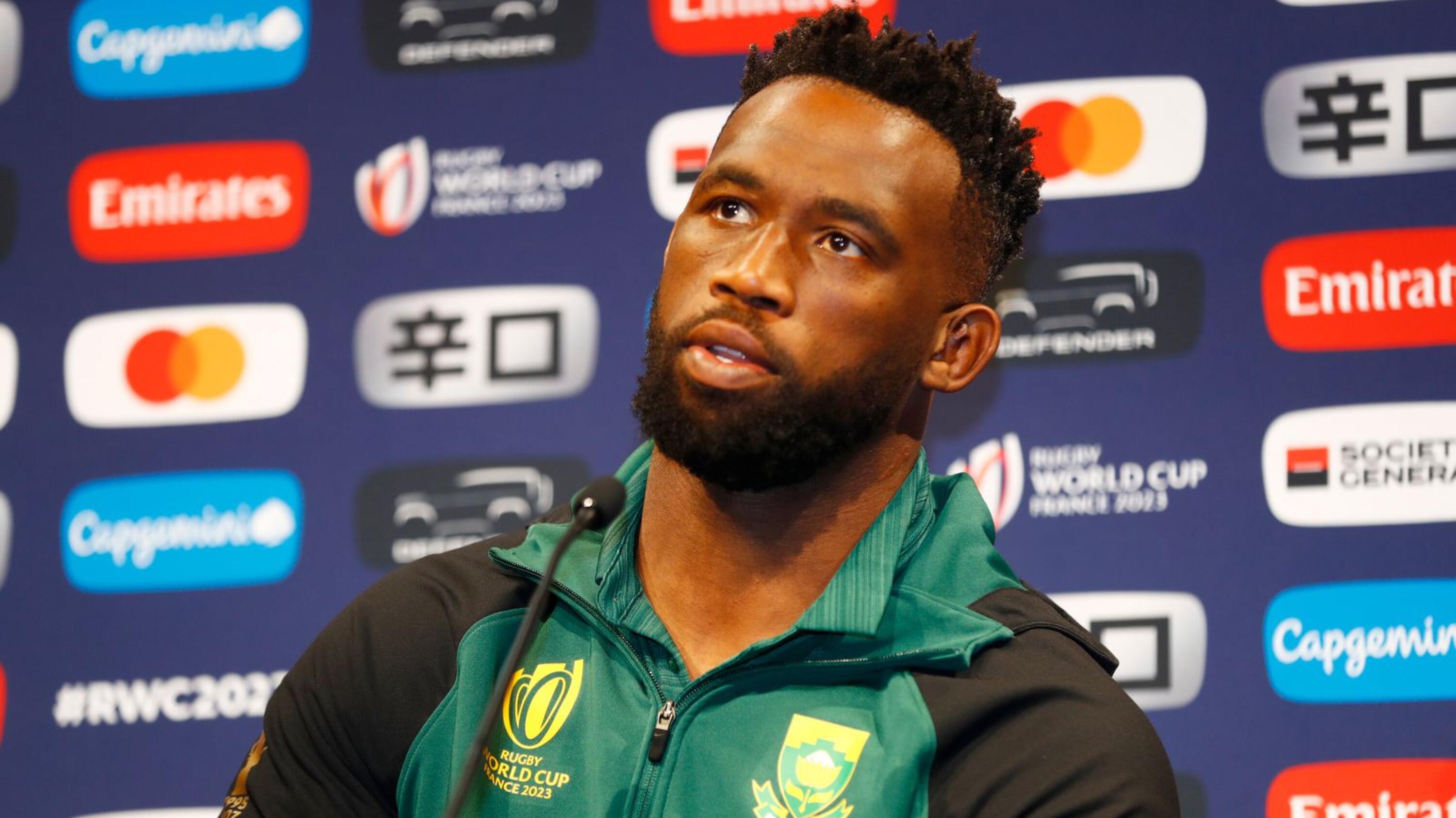 Siya Kolisi listens to a questions at Rugby World Cup press conference 