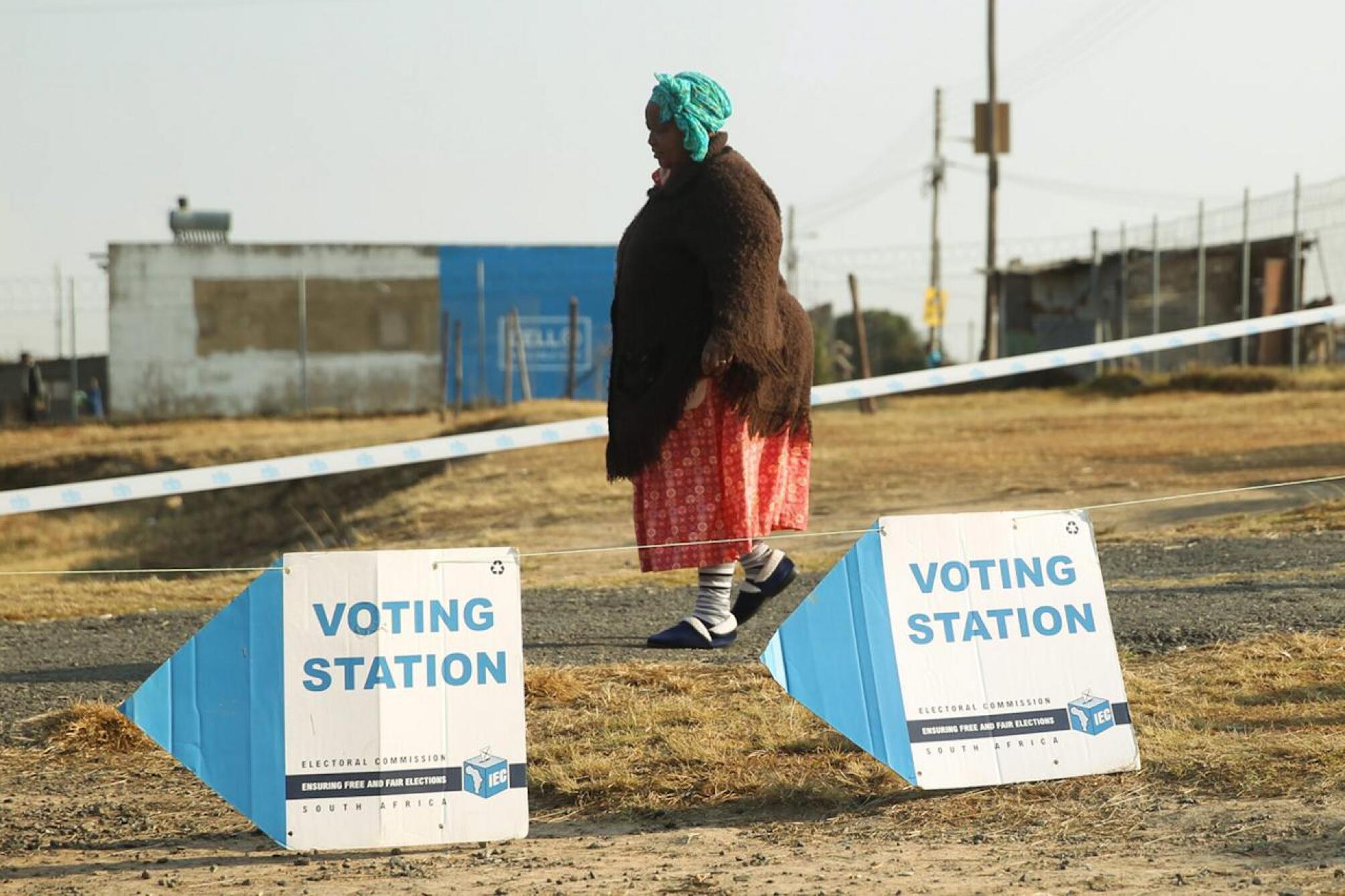 A woman woman a voting station