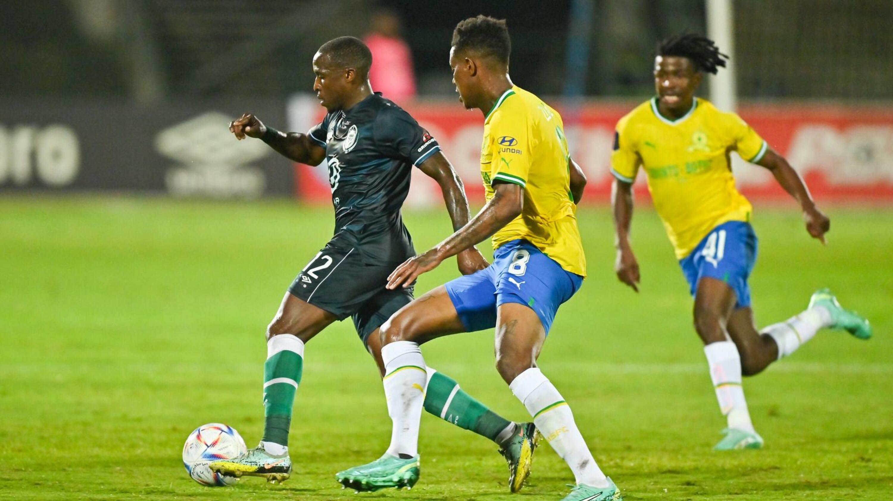 Bongani Zungu of Mamelodi Sundowns challenges George Maluleka of AmaZulu FC during their DStv Premiership game at Princess Magogo Stadium in Durban on Wednesday