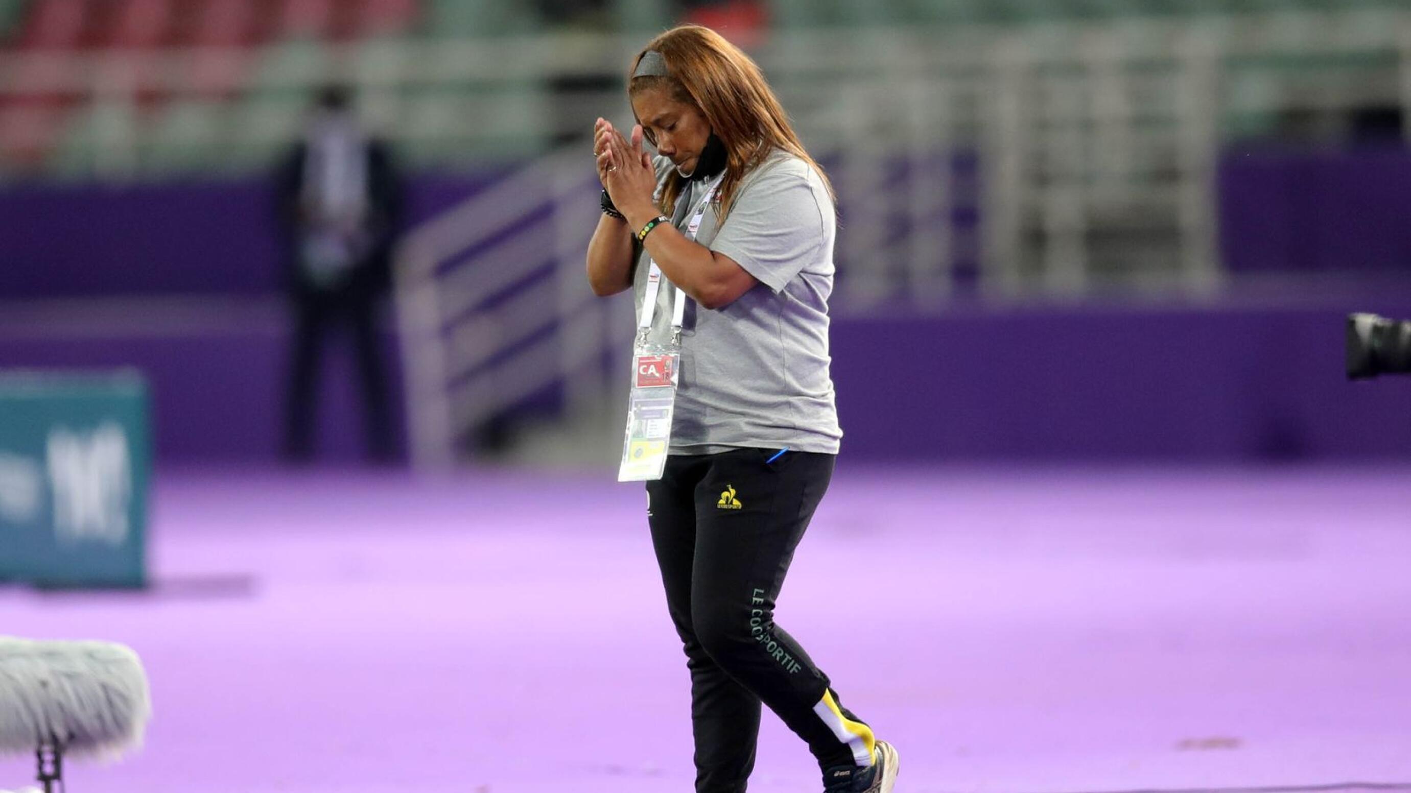 Banyana coach Desiree Ellis applauds on the sidelines 