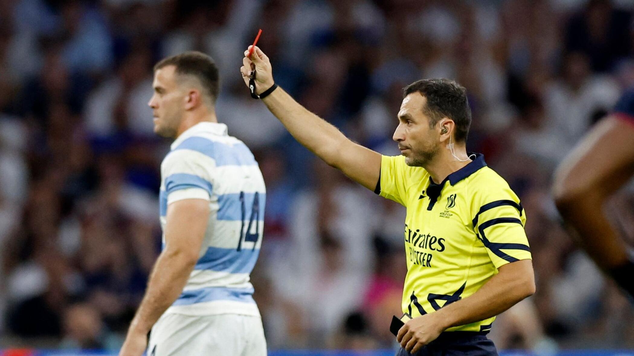 Referee Mathieu Raynal shows a red card to England's Tom Curry after a TMO review during the Rugby World Cup match between England and Argentina in Marseille