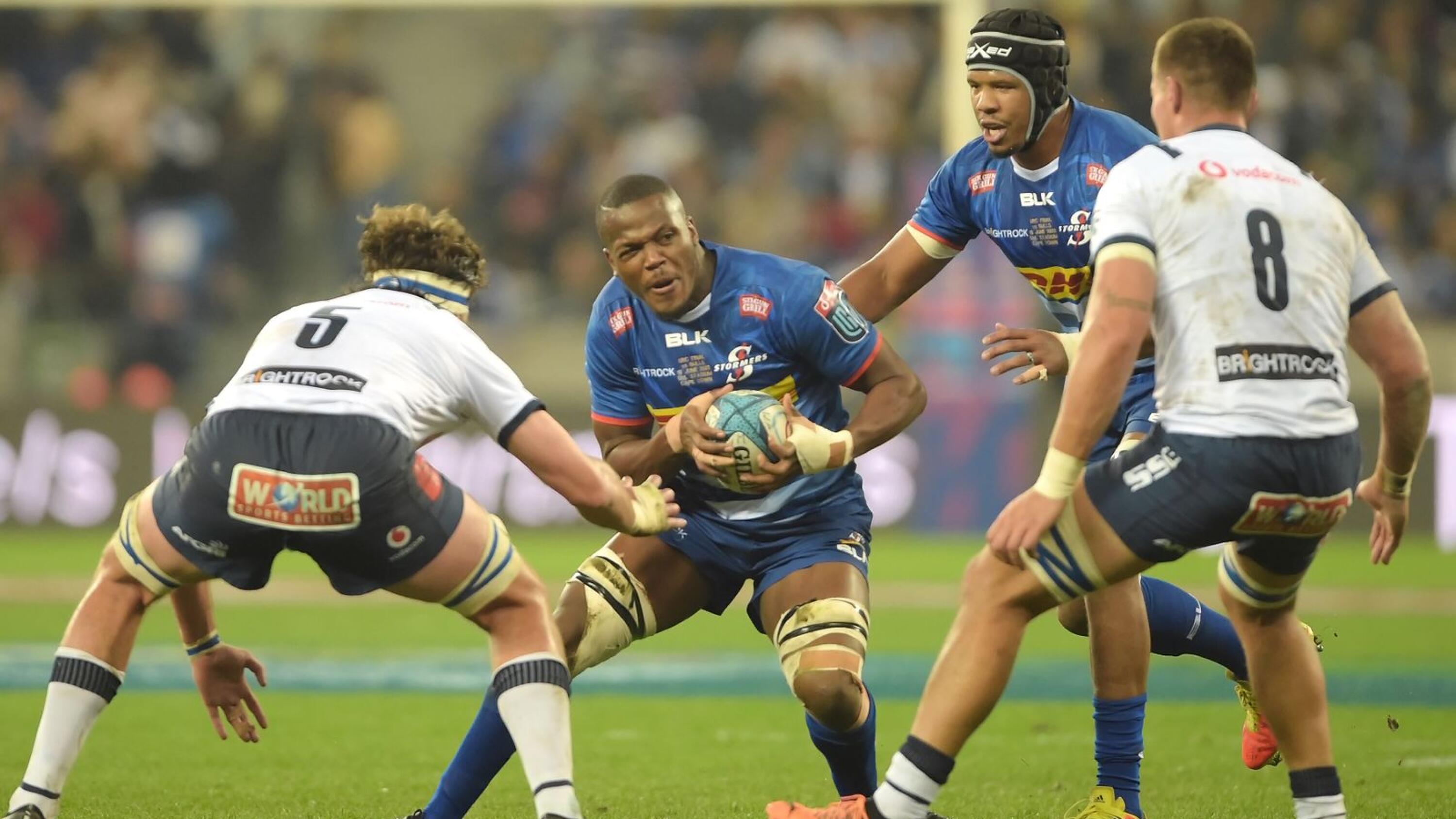 DHL Stormers’ loose forward Hacjivah Dayimani is challenged by Ruan Nortje  of the Blue Bulls during the United Rugby Championship final at Cape Town Stadium on Saturday