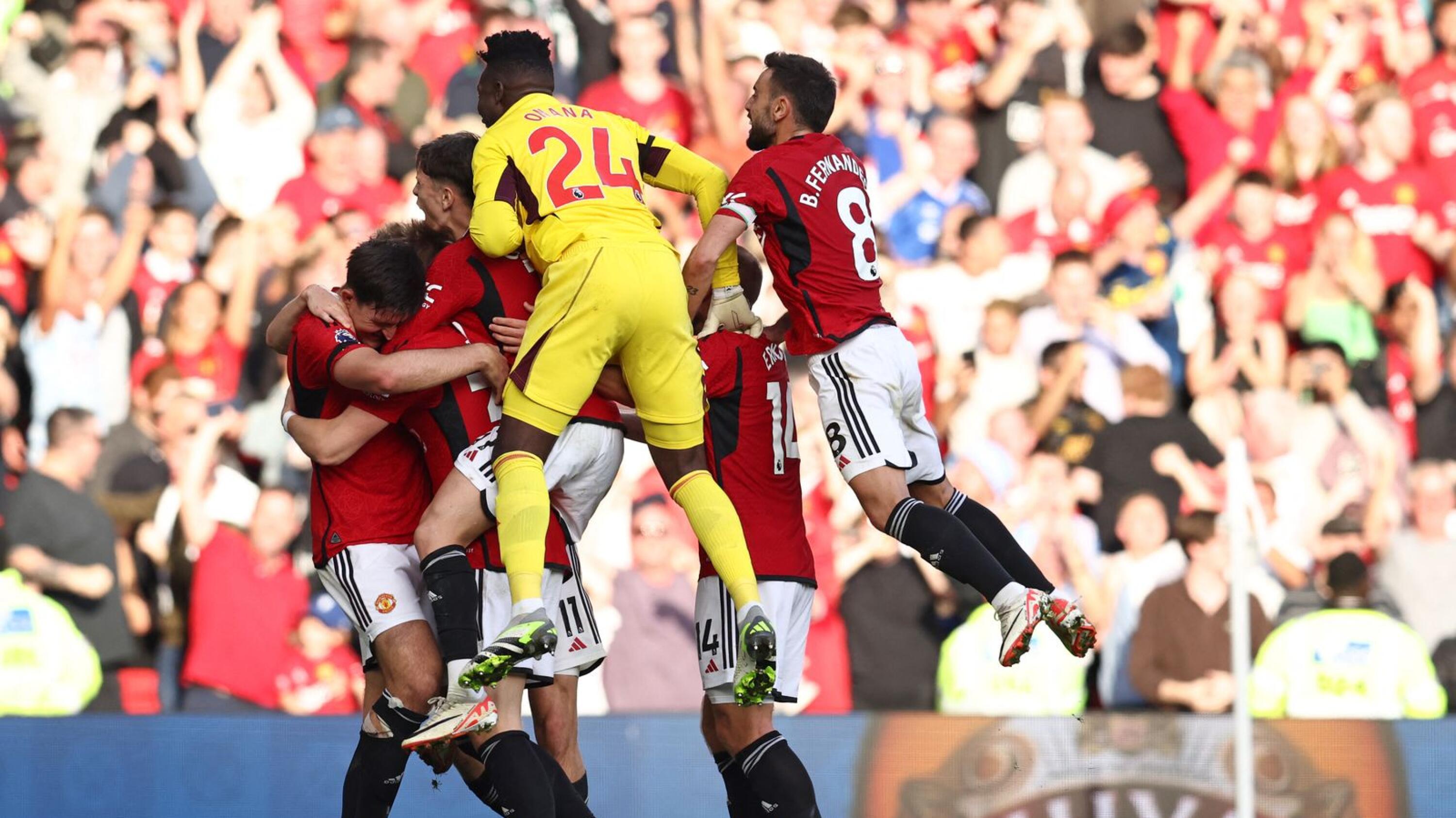 Manchester United's Scott McTominay celebrates with teammates after scoring the winning goal during their Premier League clash against Brentford