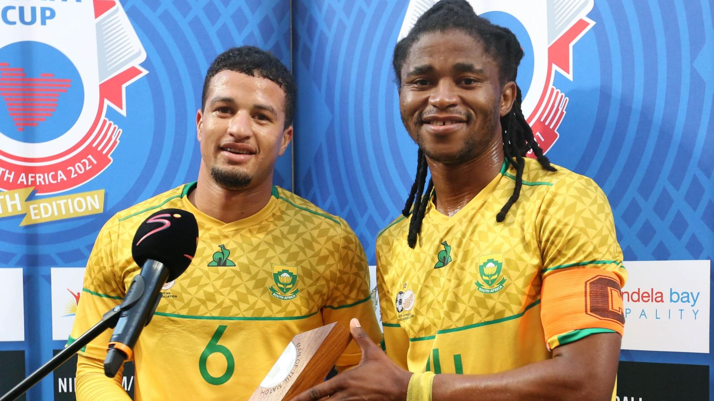 South Africa’s Yusuf Maart receives the man of the match award from teammate Siyathemba Sithebe at the end of their Cosafa Cup match against Zambia at Nelson Mandela Bay Stadium in Gqeberha on Wednesday