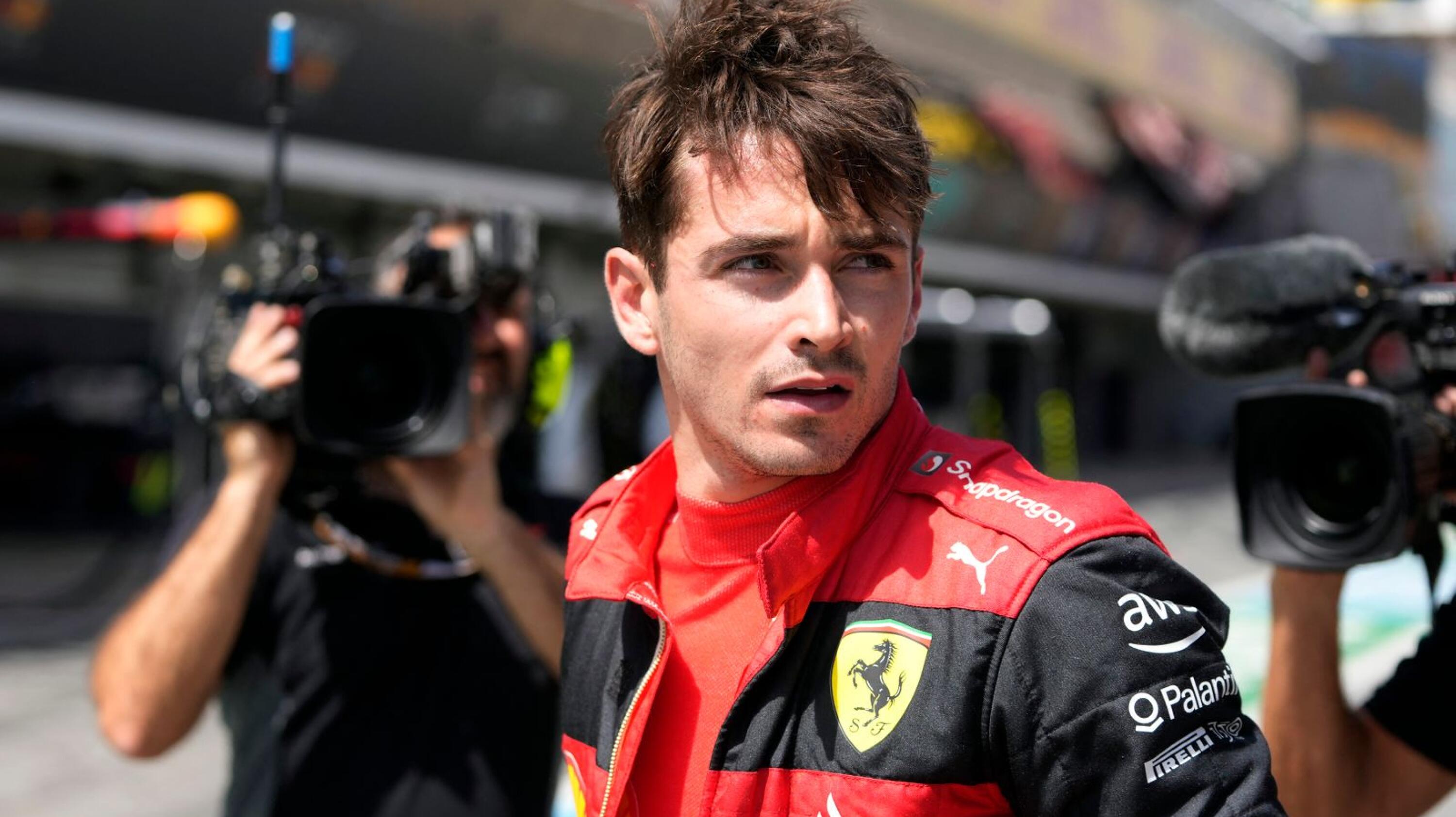 Ferrari's Monegasque driver Charles Leclerc reacts at the pitlane after his car's breakdown during the Spanish Formula One Grand Prix
