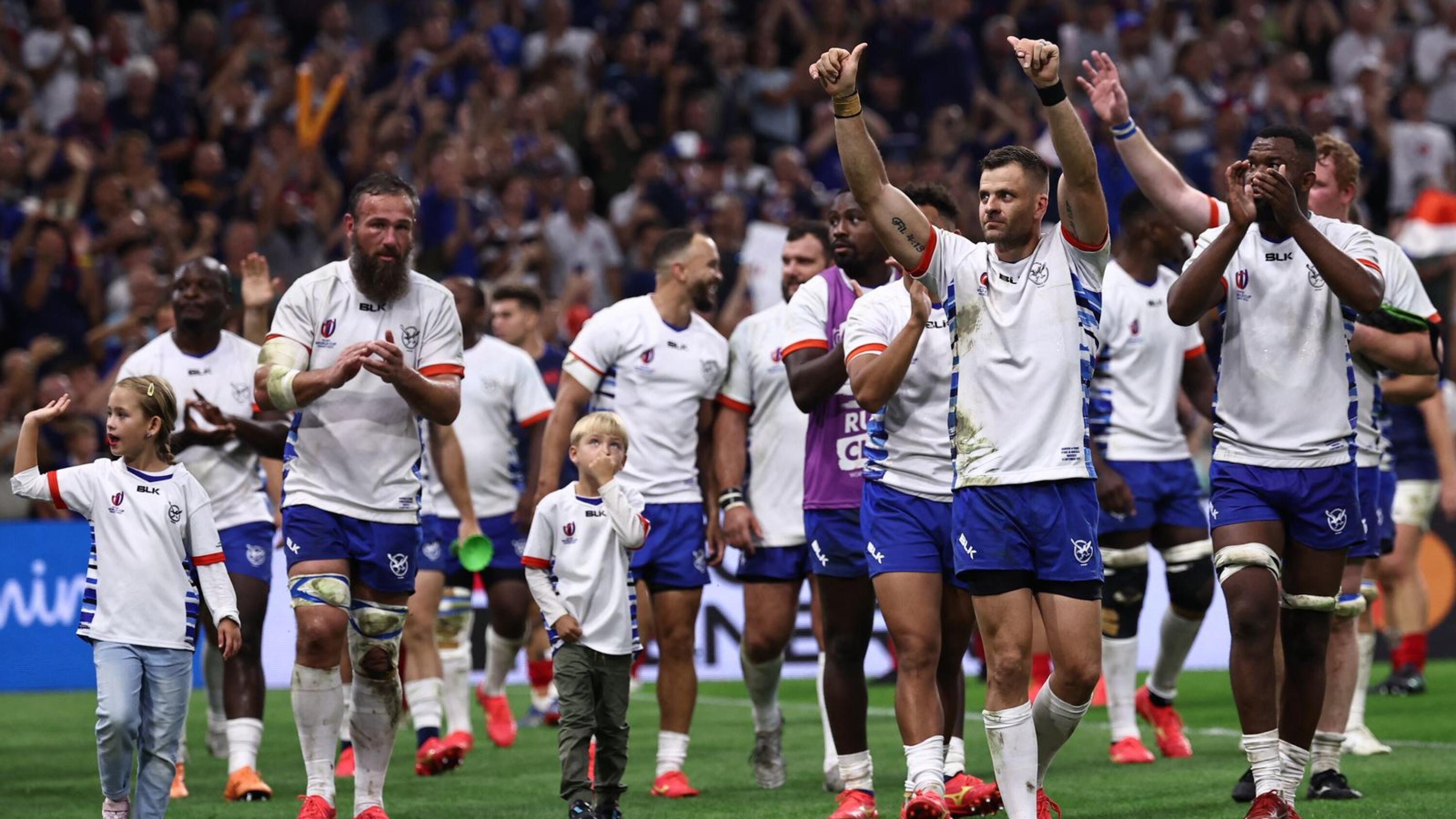 Namibia's players acknowledge the crowd at the end of the France 2023 Rugby World Cup Pool A match between France and Namibia at the Stade de Velodrome in Marseille, southern France