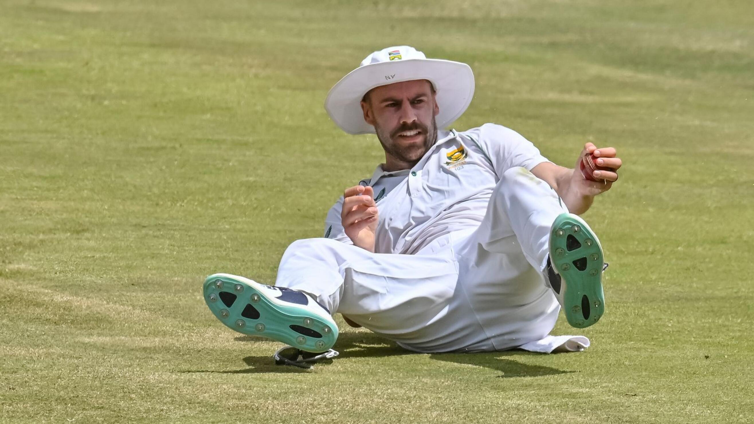Proteas fast bowler Anrich Nortje fields a ball during a Test match