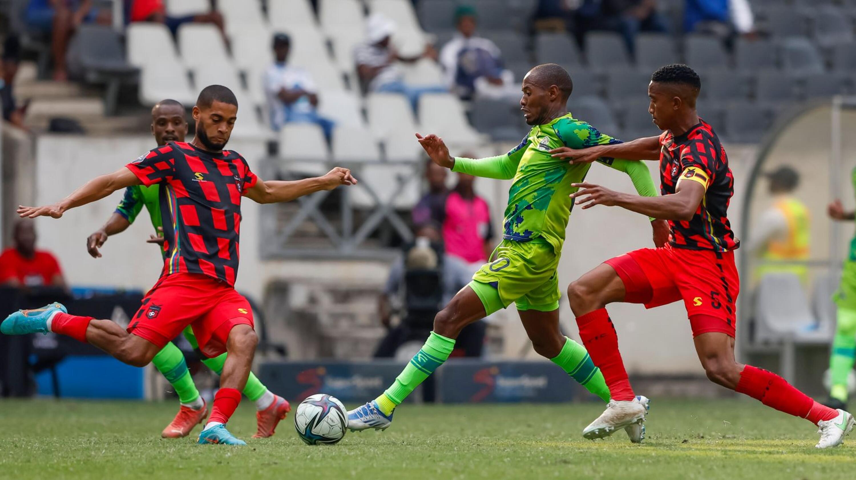 Ebrahim Seedat of TS Galaxy FC and Sibusiso Sibeko of Marumo Gallants FC fight for the ball during their DStv Premiership match at Mbombela Stadium in Mbombela on Saturday