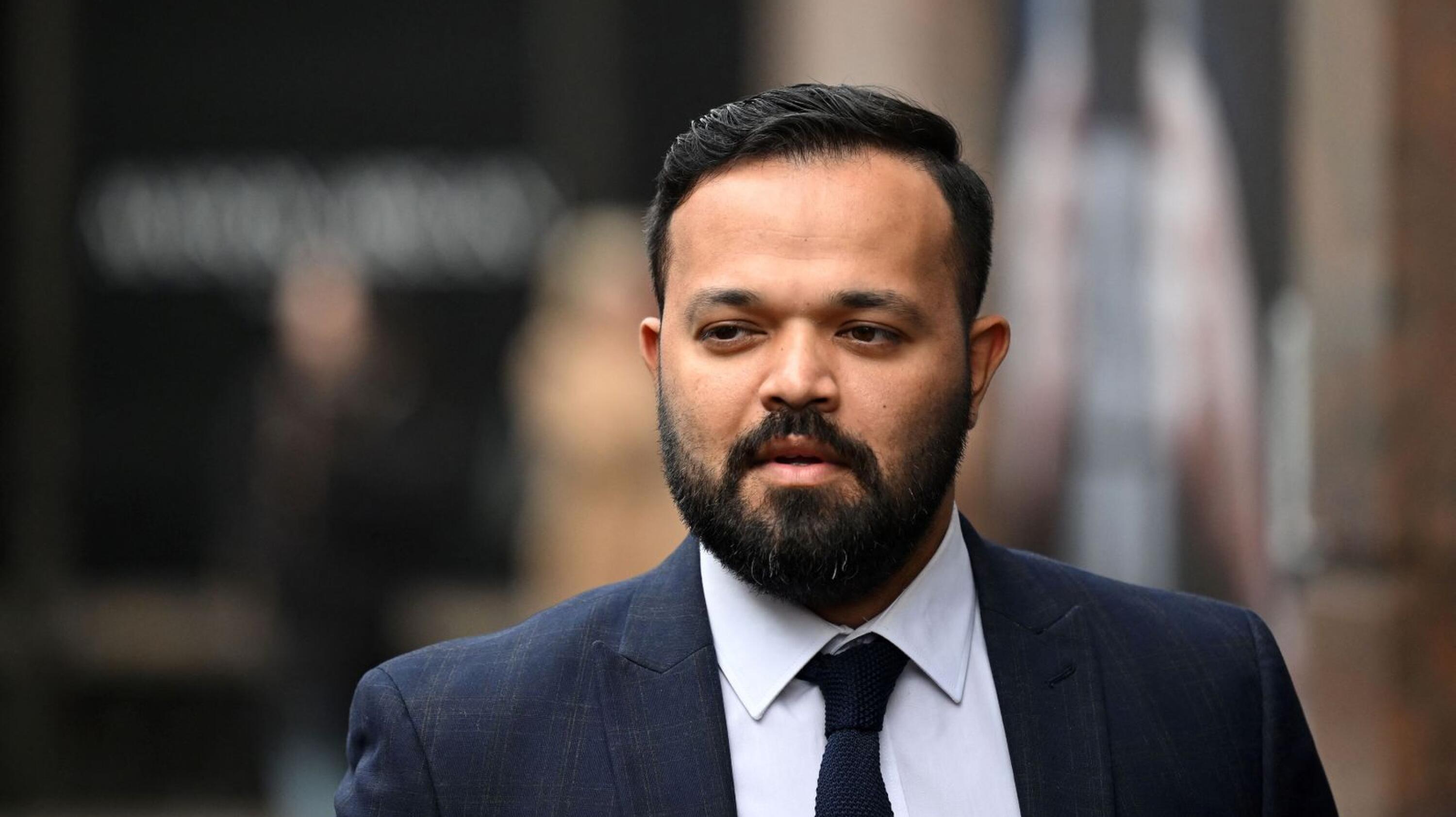 Former cricketer Azeem Rafiq arrives to attend a Cricket Discipline Commission hearing, relating to allegations of racism at Yorkshire County Cricket Club, in London