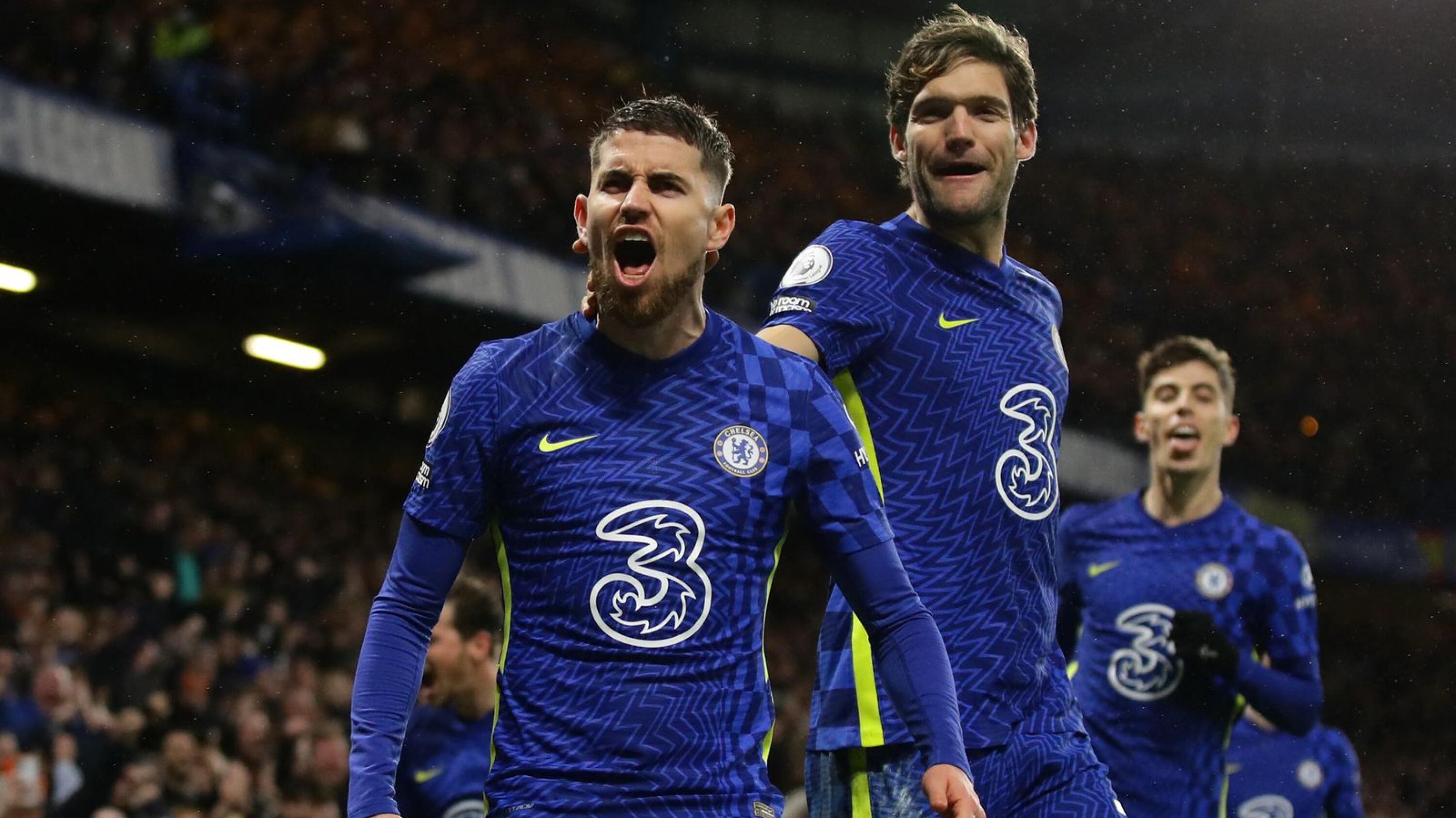 Chelsea's Jorginho celebrates with Marcos Alonso after scoring their second goal during their Premier League game against Leeds United at Stamford Bridge in London on Saturday
