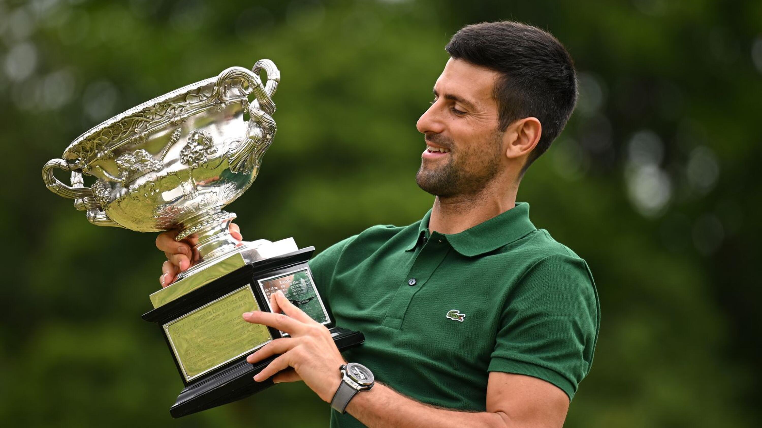 Novak Djokovic of Serbia poses with the Norman Brooks Challenge Cup following his win in the men's singles final in the 2023 Australian Open tennis tournament
