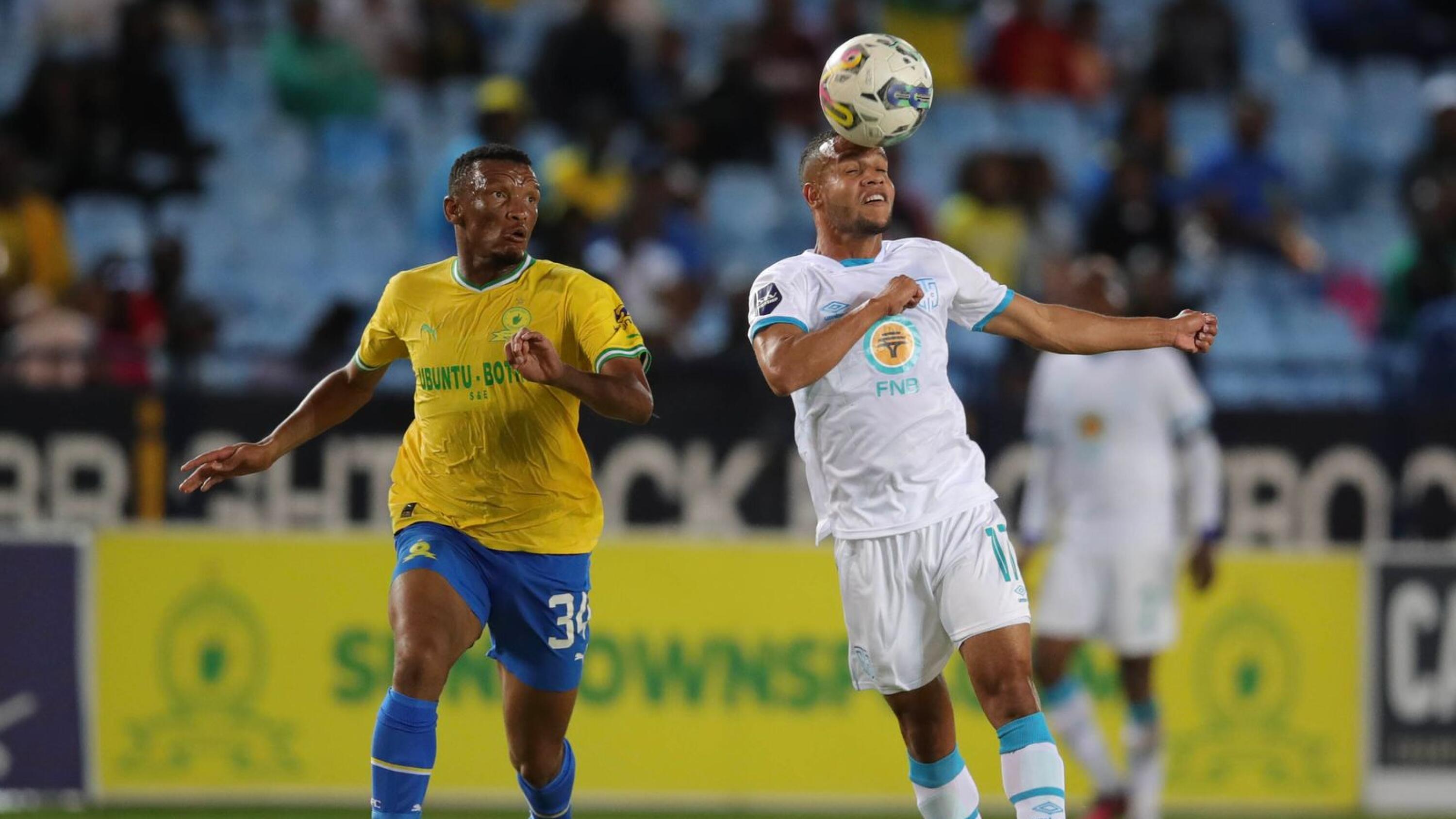 Juan Zapata Londono of Cape Town is challenged by Mothobi Mvala of Mamelodi Sundowns during their DStv Premiership match at Loftus Versfeld in Tshwane on Tuesday