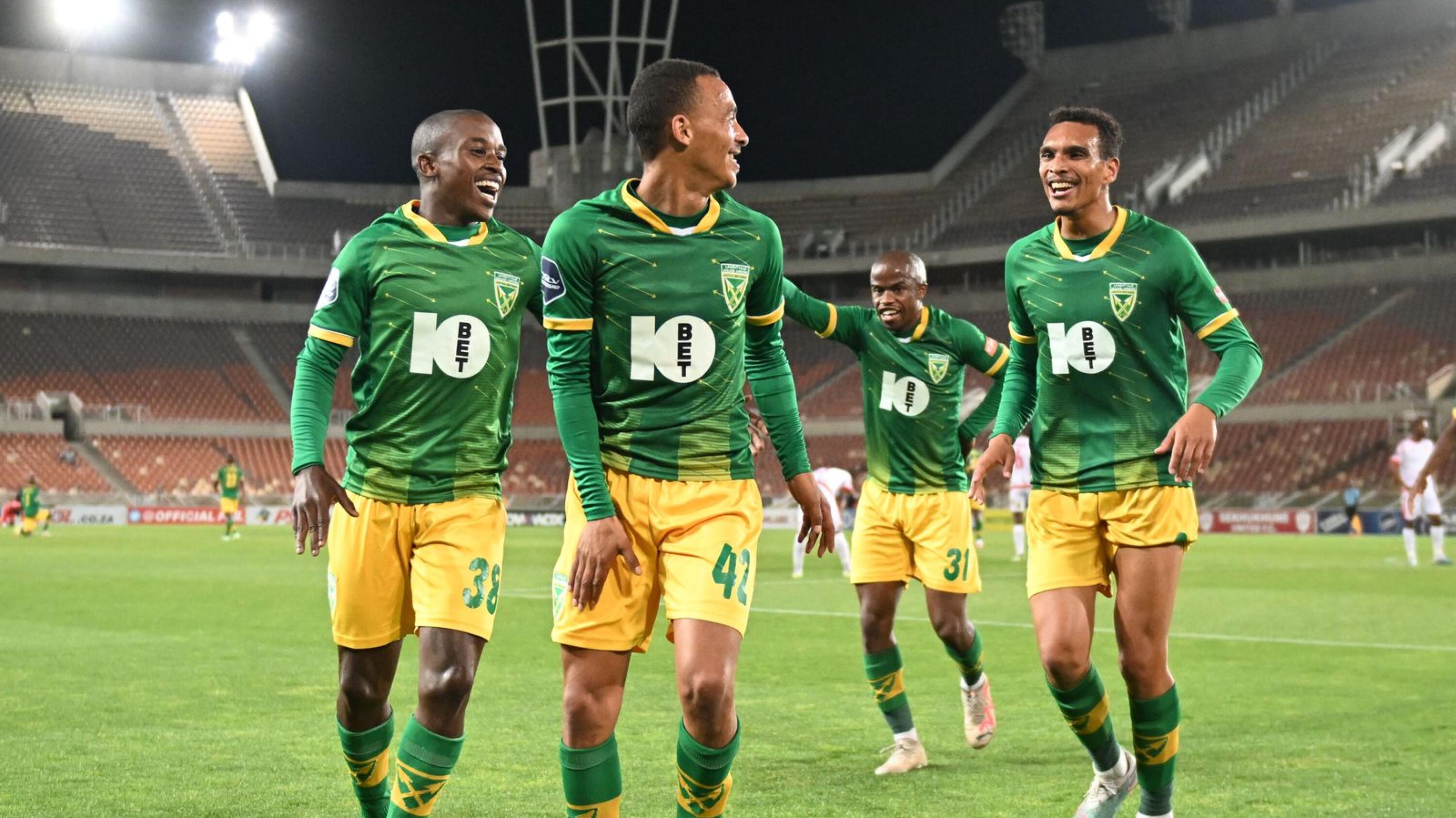 Golden Arrows’ Brandon Theron celebrates with teammates after scoring a goal during their DStv Premiership match against Sekhukhune United
