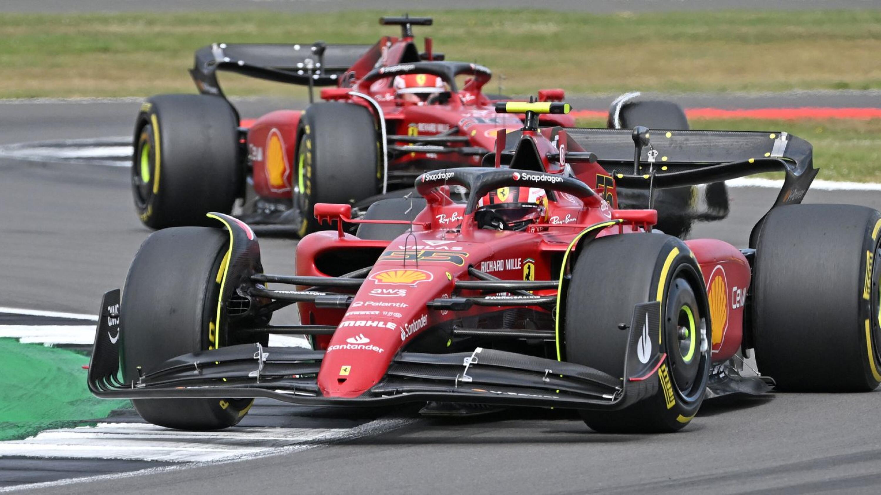 Ferrari's Spanish driver Carlos Sainz Jr (L) leads Ferrari's Monegasque driver Charles Leclerc during the Formula One British Grand Prix at the Silverstone motor racing circuit in Silverstone, central England on Sunday
