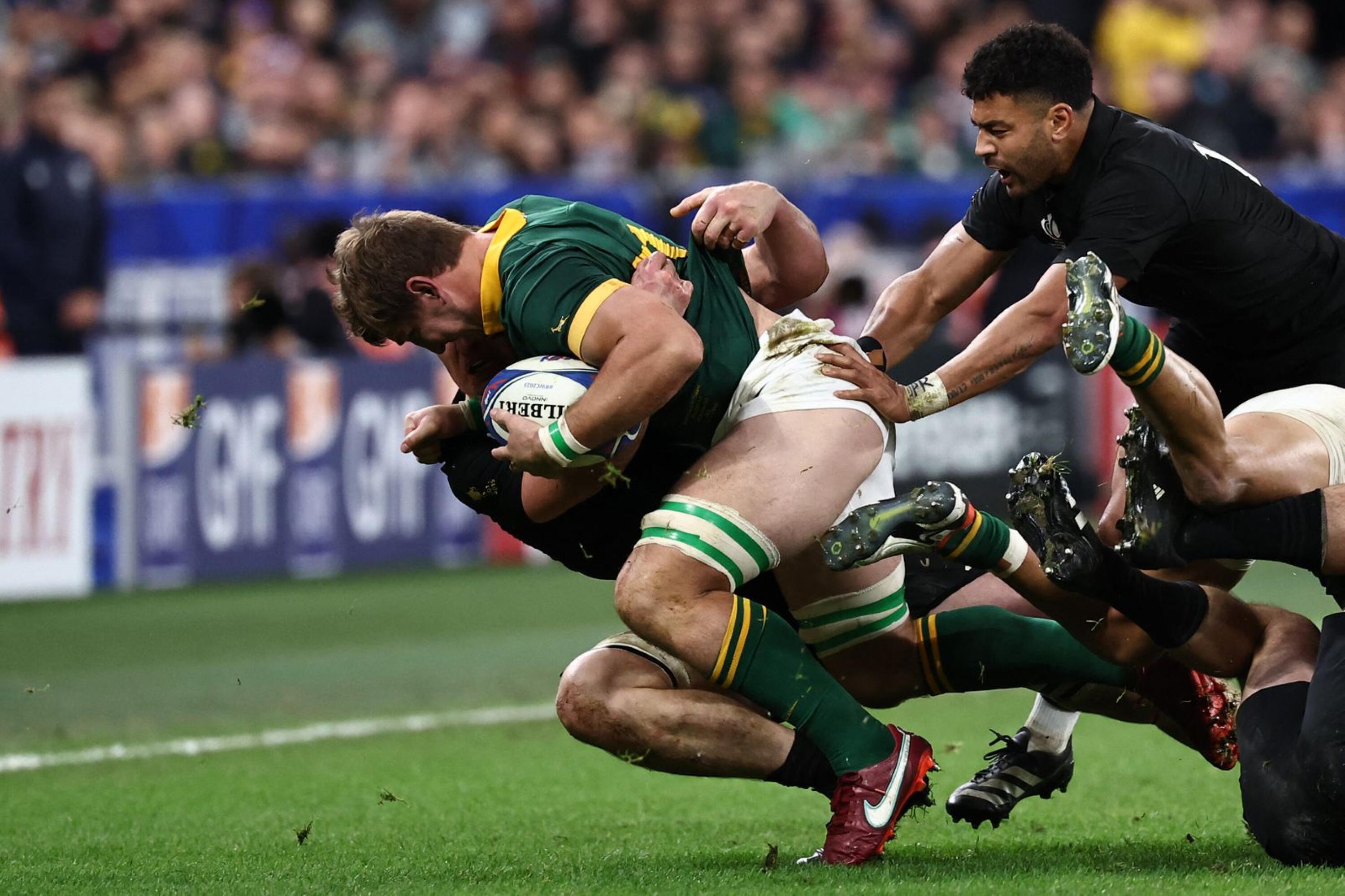 South Africa's flanker Kwagga Smith is tackled during the Rugby World Cup Final against New Zealand at the Stade de France in Saint-Denis on Saturday