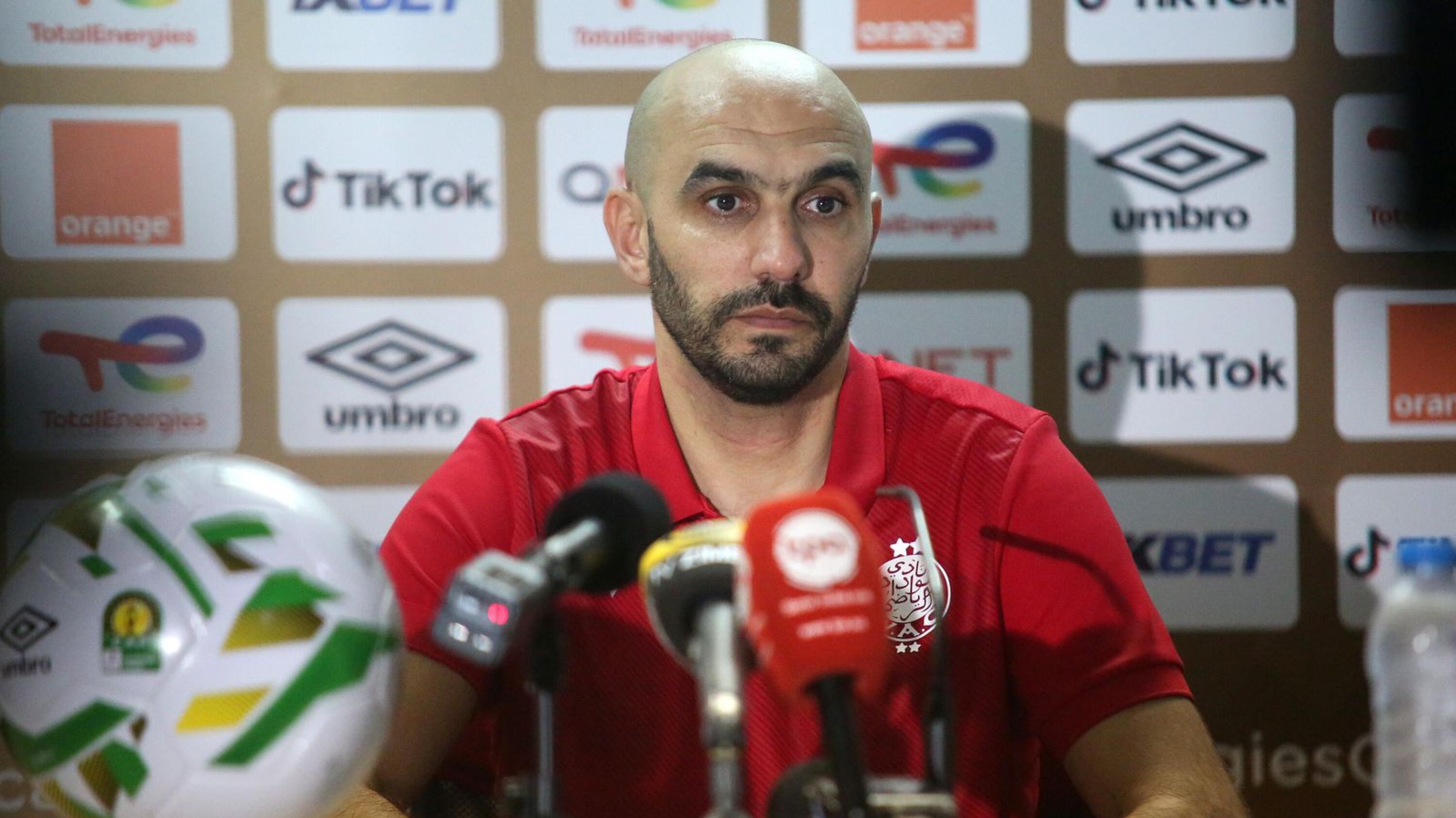 Wydad Athletic Club head coach Walid Regragui speaks during the post match press conference after their CAF Champions League semi-final first leg match against Petro de Luanda at the 11 November Stadium in Luanda, Angola