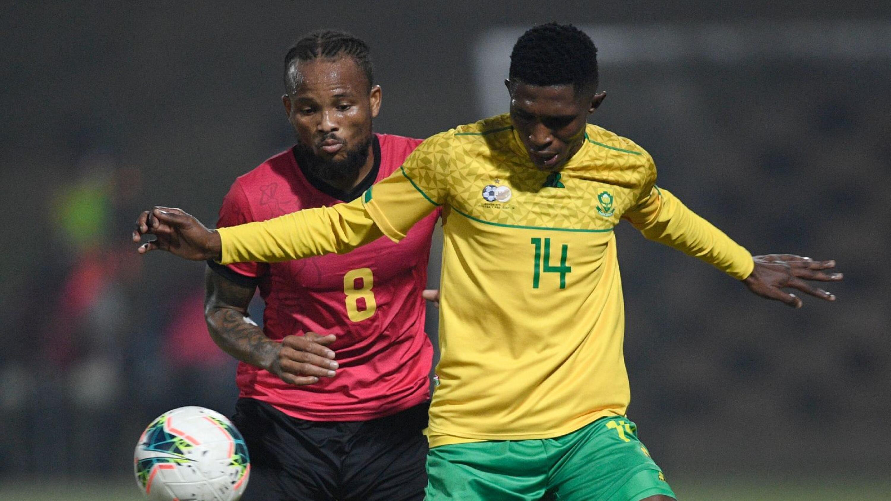 Keletso Sifama of South Africa is challenged Edmilson Dove of Mozambique during their Hollywoodbets Cosafa Cup quarter-final match at King Zwelithini Stadium in Umlazi on Wednesday