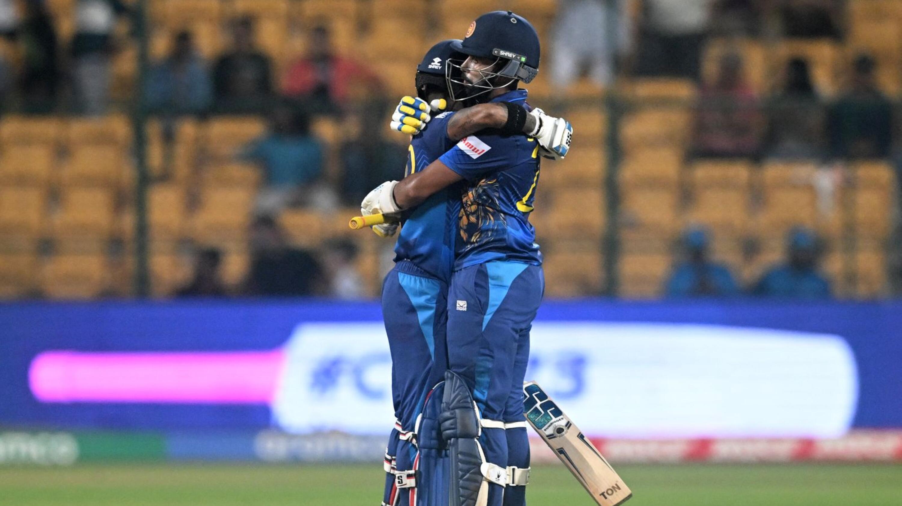 Sri Lanka's Sadeera Samarawickrama and Pathum Nissanka celebrate after winning their Cricket World Cup match against England
