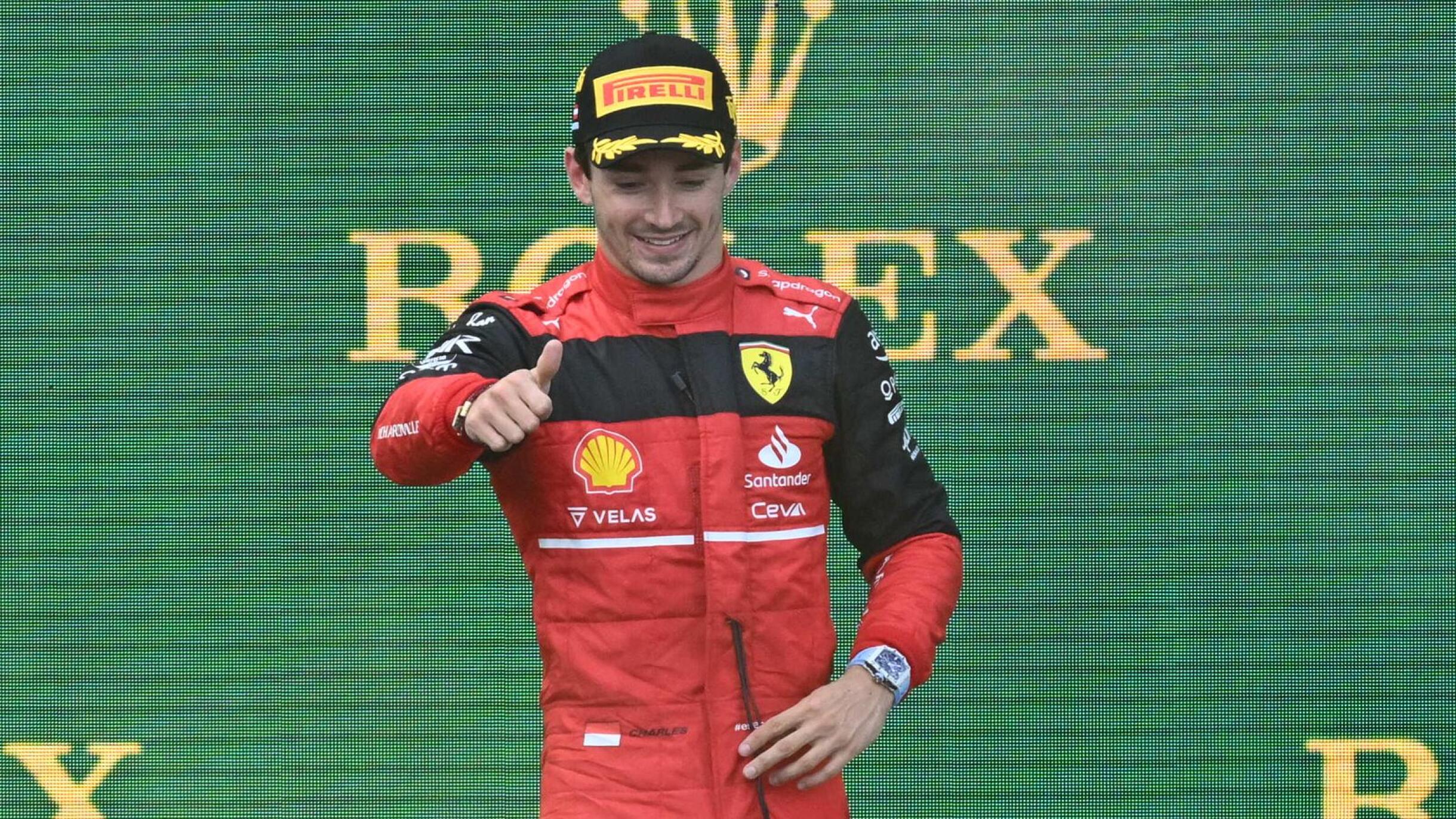 Ferrari's Monegasque driver Charles Leclerc celebrates on the podium after winning the Formula One Austrian Grand Prix at the Red Bull Ring race track in Spielberg, Austria, on Sunday