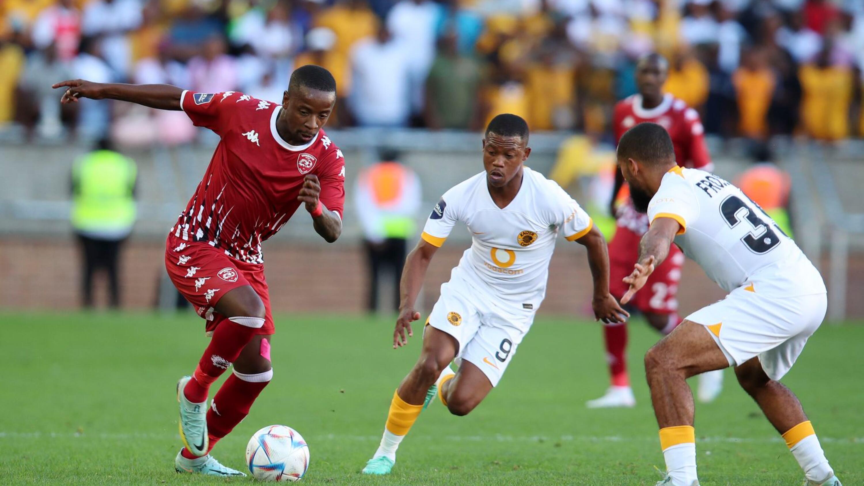 Vusimuzi Mncube of Sekhukhune United is challenged by Reeve Frosler and Ashley du Preez of Kaizer Chiefs during Sunday’s DStv Premiership match at the Peter Mokaba Stadium in Polokwane